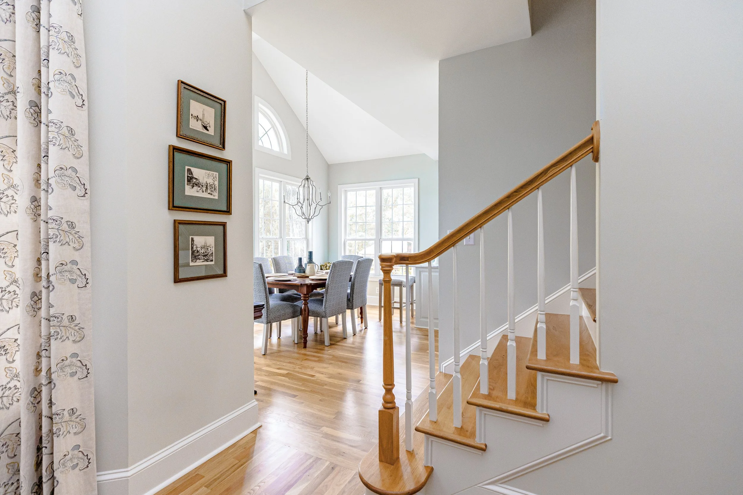A quintessential Southern formal living room by Cossart Design, blending classic elegance with modern comfort. Warm tones, layered textures, and tailored furnishings create a welcoming space for entertaining or quiet afternoons. Thoughtful accents an