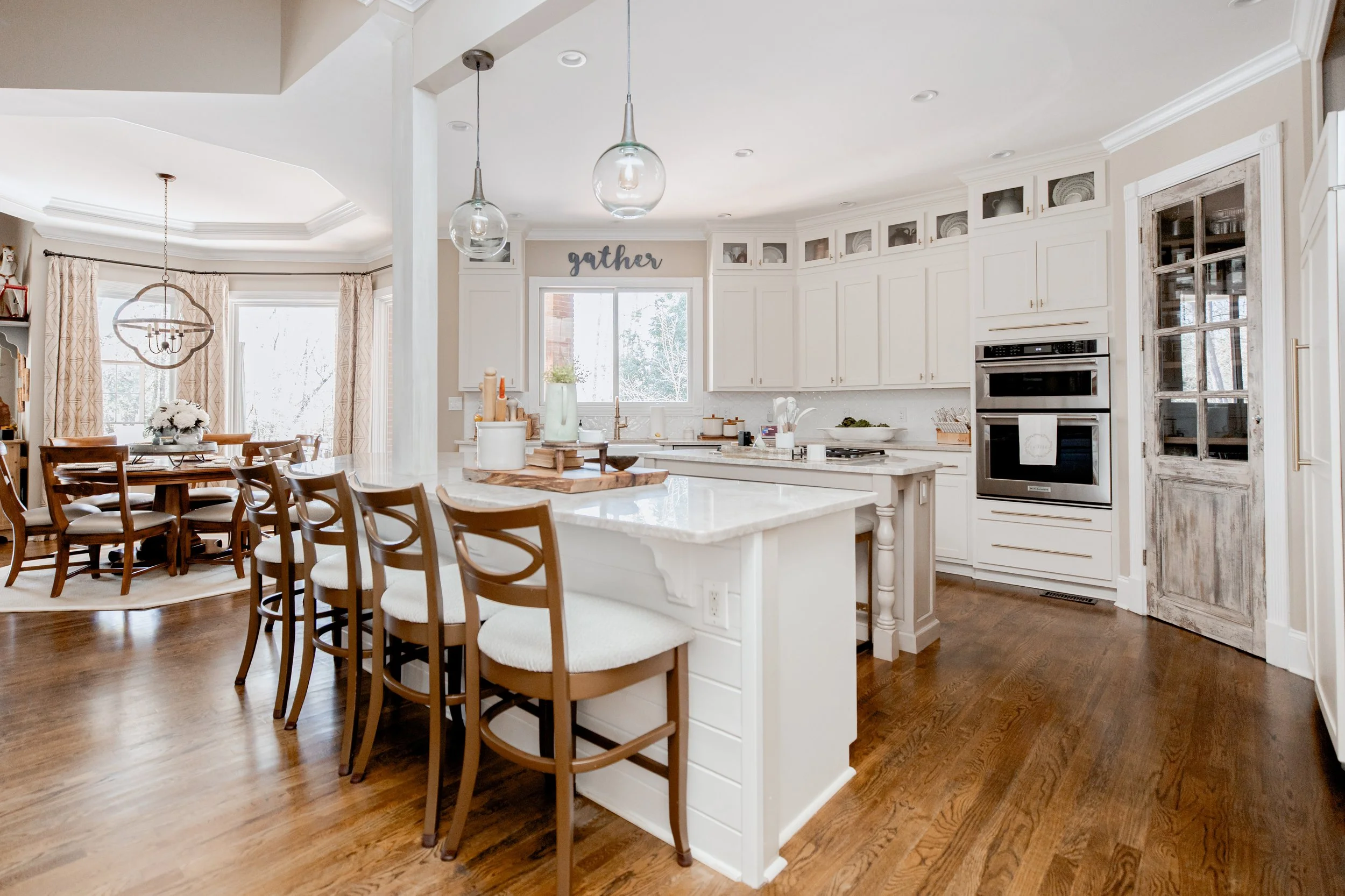 A classic and refined kitchen by Cossart Design, with custom cabinetry, high-end finishes, and a thoughtful layout that balances everyday functionality with elegant design. The space features bespoke details, tailored lighting, and coordinated materi