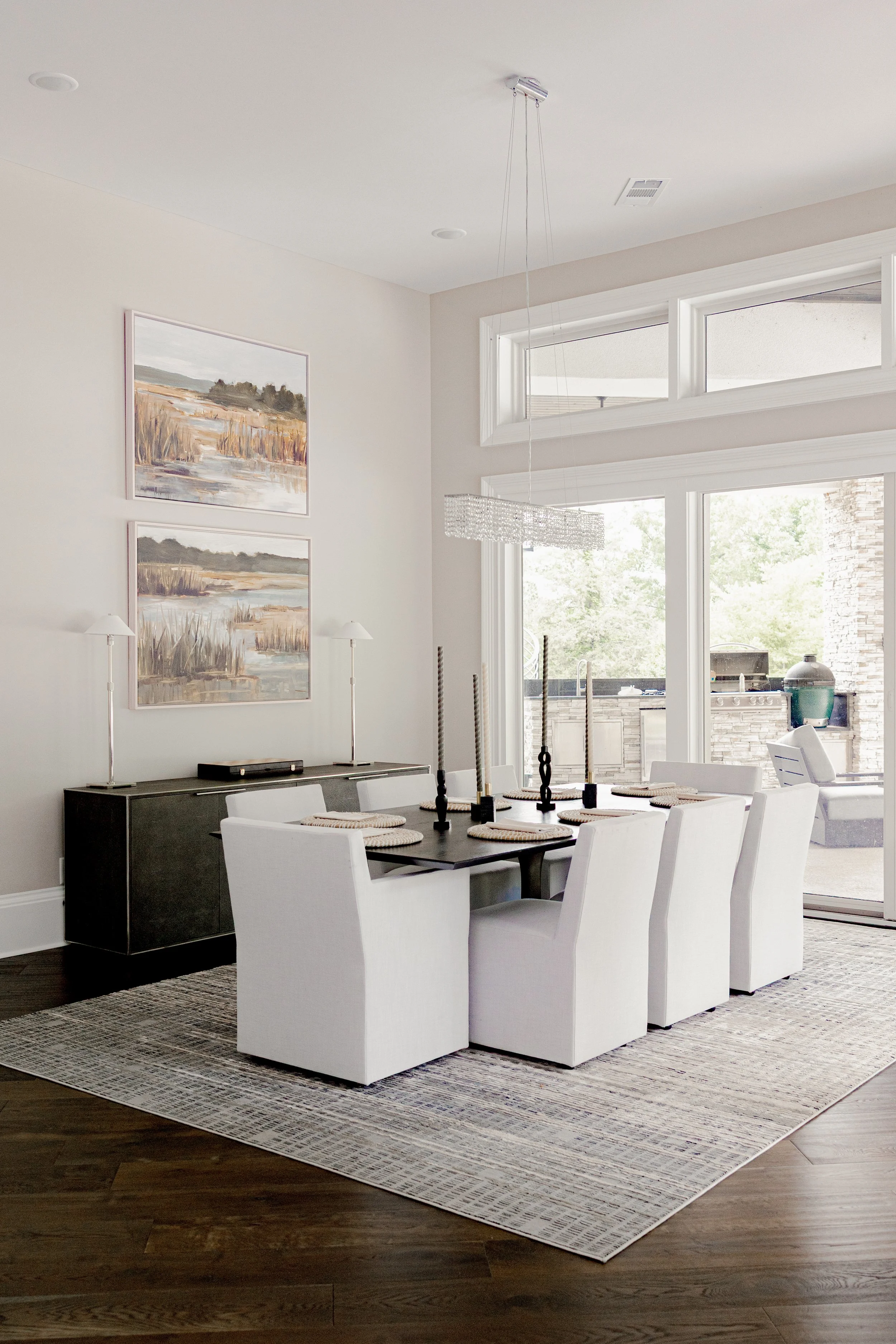 An elegant dining space designed for gathering and connection. Thoughtfully selected furnishings and refined finishes create a setting that feels both elevated and inviting. This space balances timeless design with everyday functionality, making it i