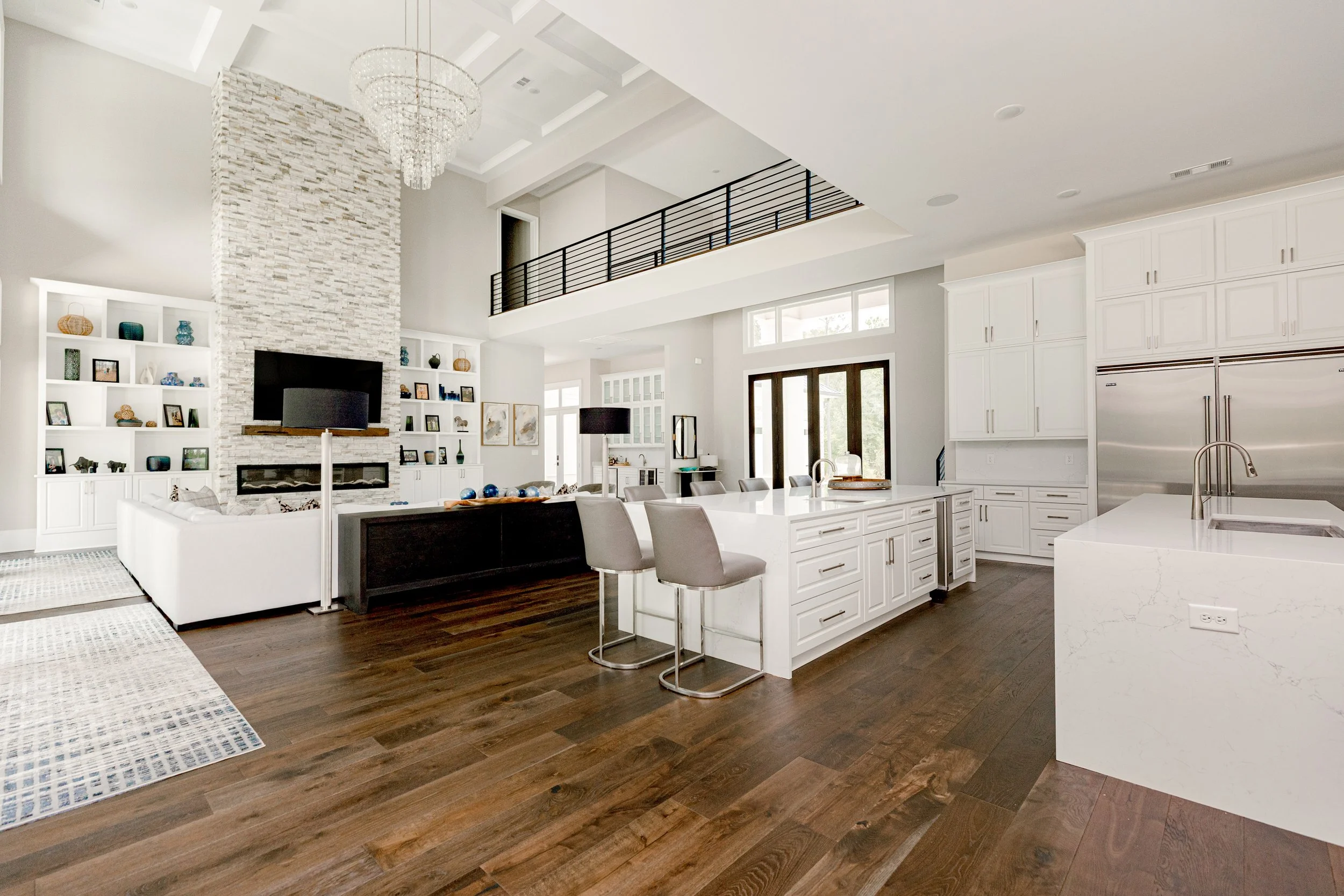 A beautifully layered living room designed to balance comfort, style, and everyday living. Thoughtful furniture placement, layered textures, and custom finishes create a space that is both functional and inviting for entertaining or quiet family mome