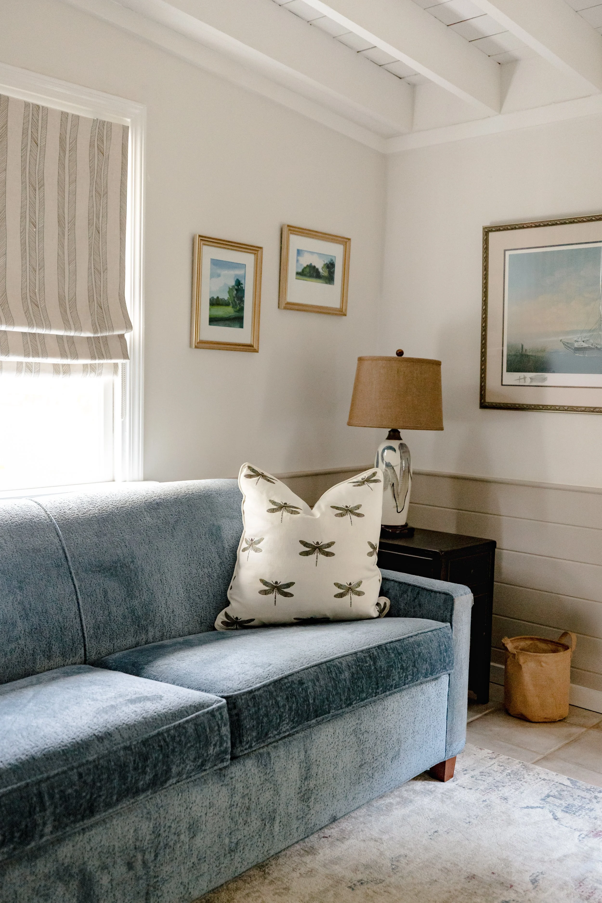 A custom designed seating area with thoughtfully selected fabrics and bespoke finishes, reflecting Cossart Design’s approach to creating interiors that feel personal and artful. Rich textures and vibrant accents elevate this space while keeping it co