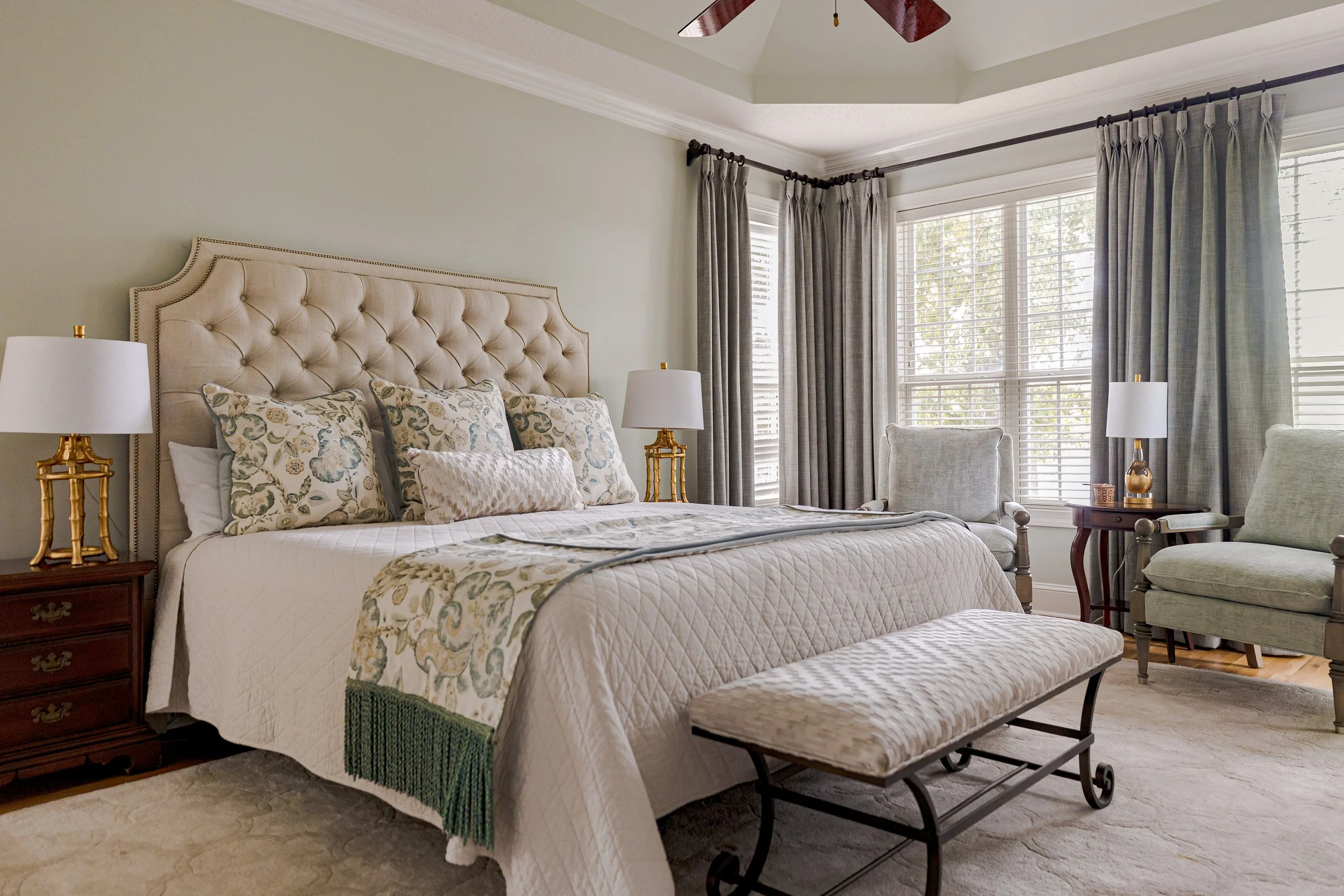 A serene master bedroom designed by Cossart Design, with soft hues, layered textures, and custom window treatments. This luxurious retreat balances comfort and elegance, offering a personal sanctuary within this quintessential Southern home.
#MasterB