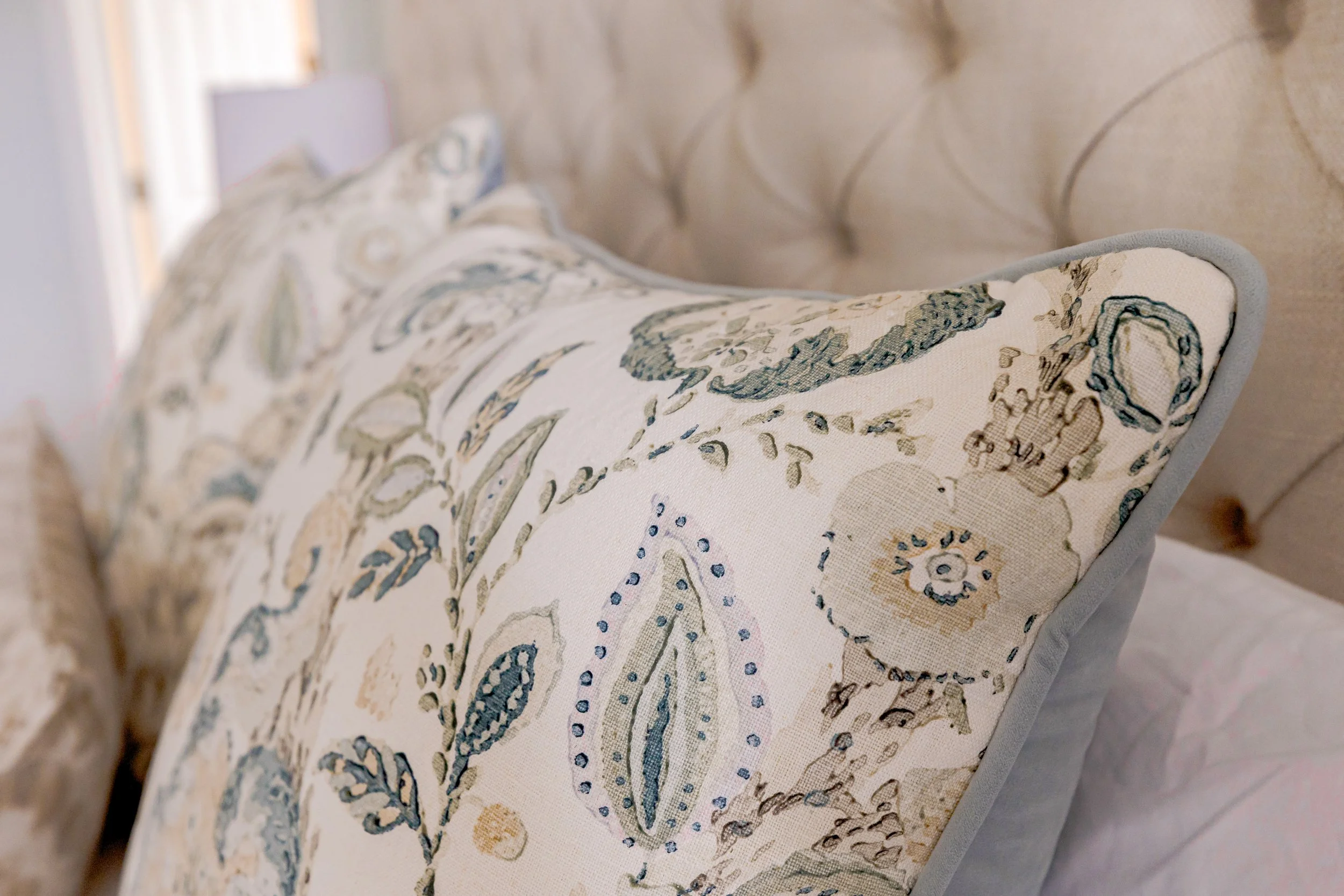 A serene master bedroom designed by Cossart Design, with soft hues, layered textures, and custom window treatments. This luxurious retreat balances comfort and elegance, offering a personal sanctuary within this quintessential Southern home.
#MasterB