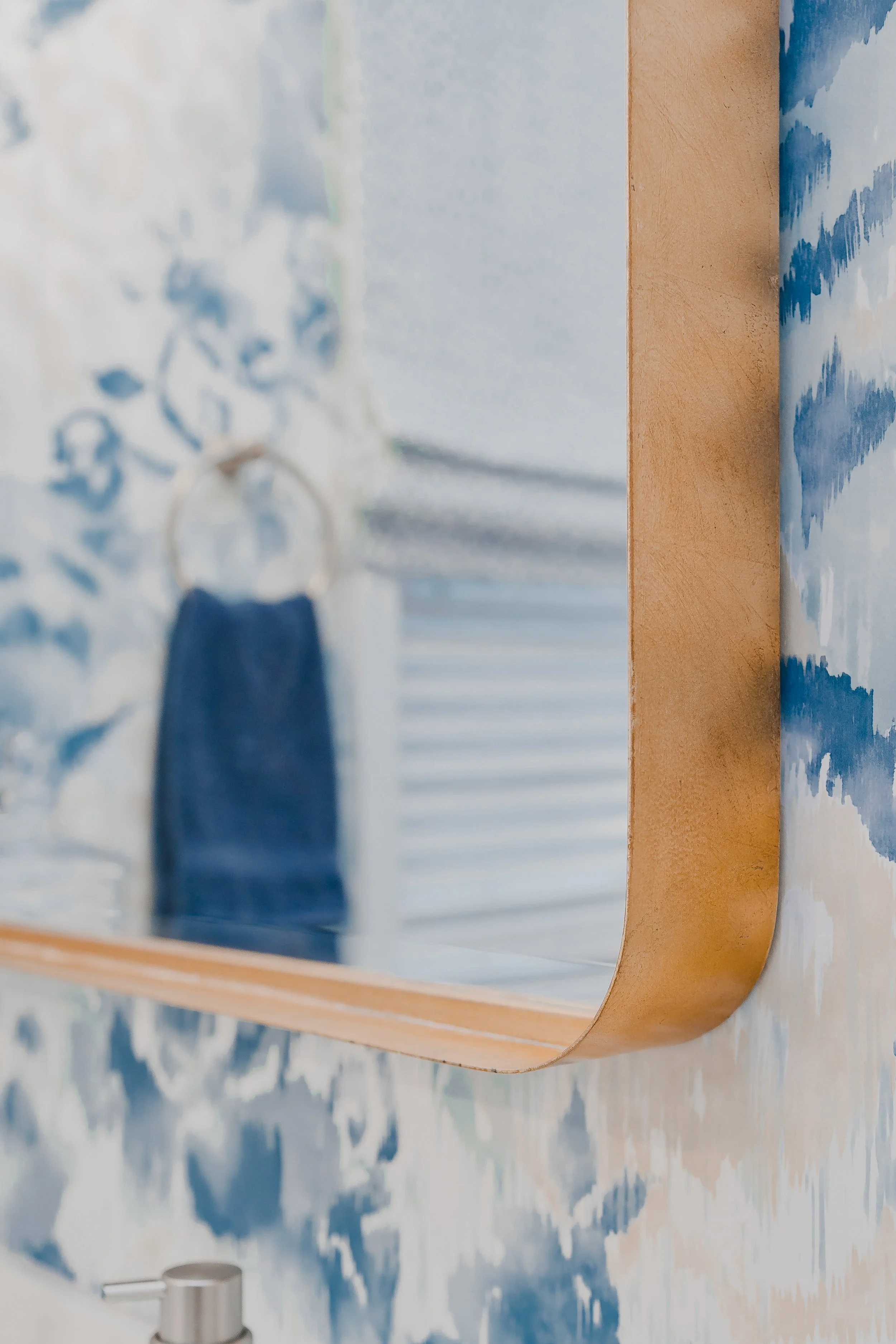 A luxurious custom bathroom designed by Cossart Design, featuring gold fixtures, elegant wallpaper and finishes, and bespoke window treatments. The space is designed for comfort and style, creating a functional yet elevated retreat within the home.
#