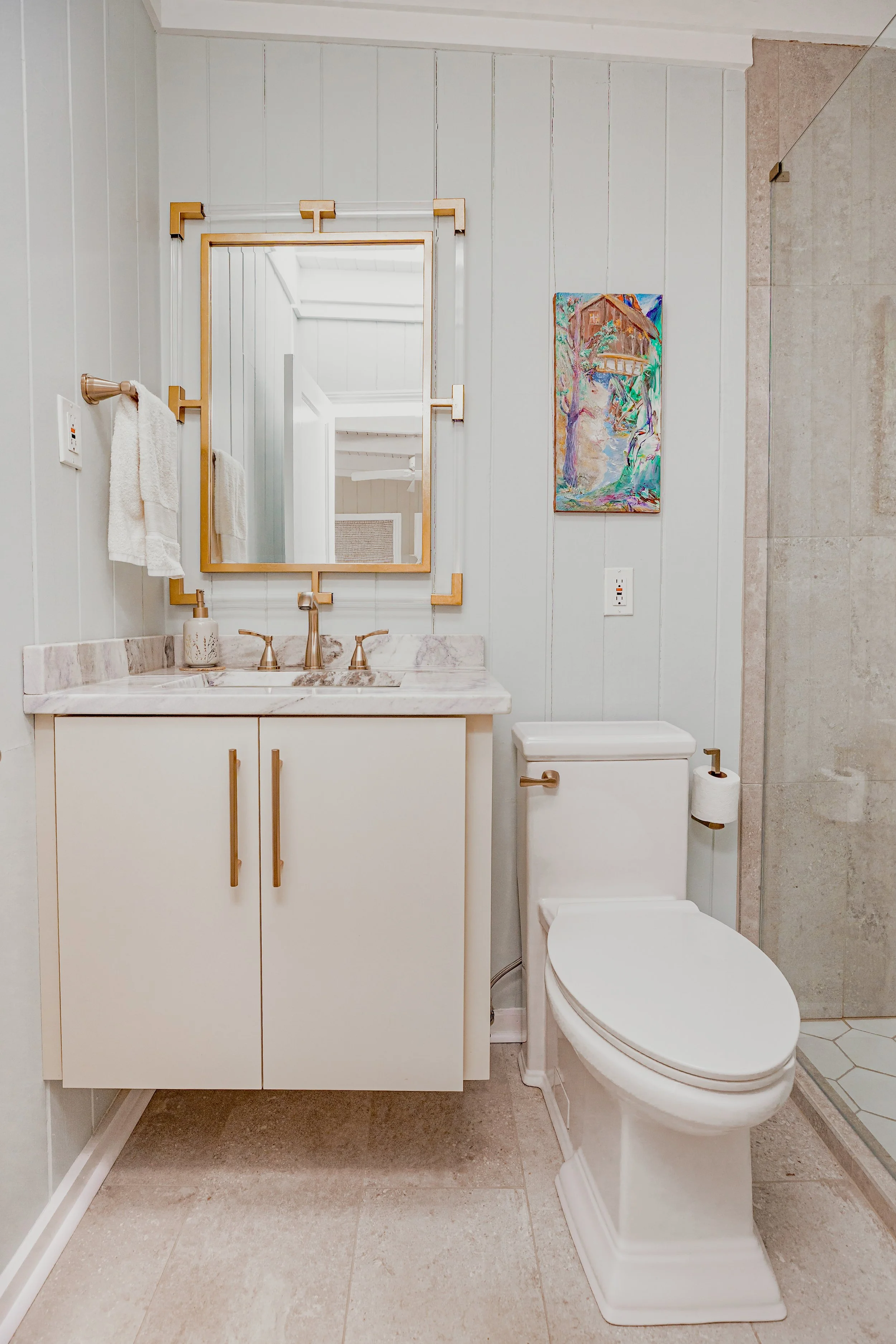 A renovated bathroom at the Gilmer Cottage showcasing clean, modern finishes that complement the home’s timeless charm. Thoughtful design and elevated materials make this space both functional and beautifully styled by Cossart Design.
#BathroomDesign