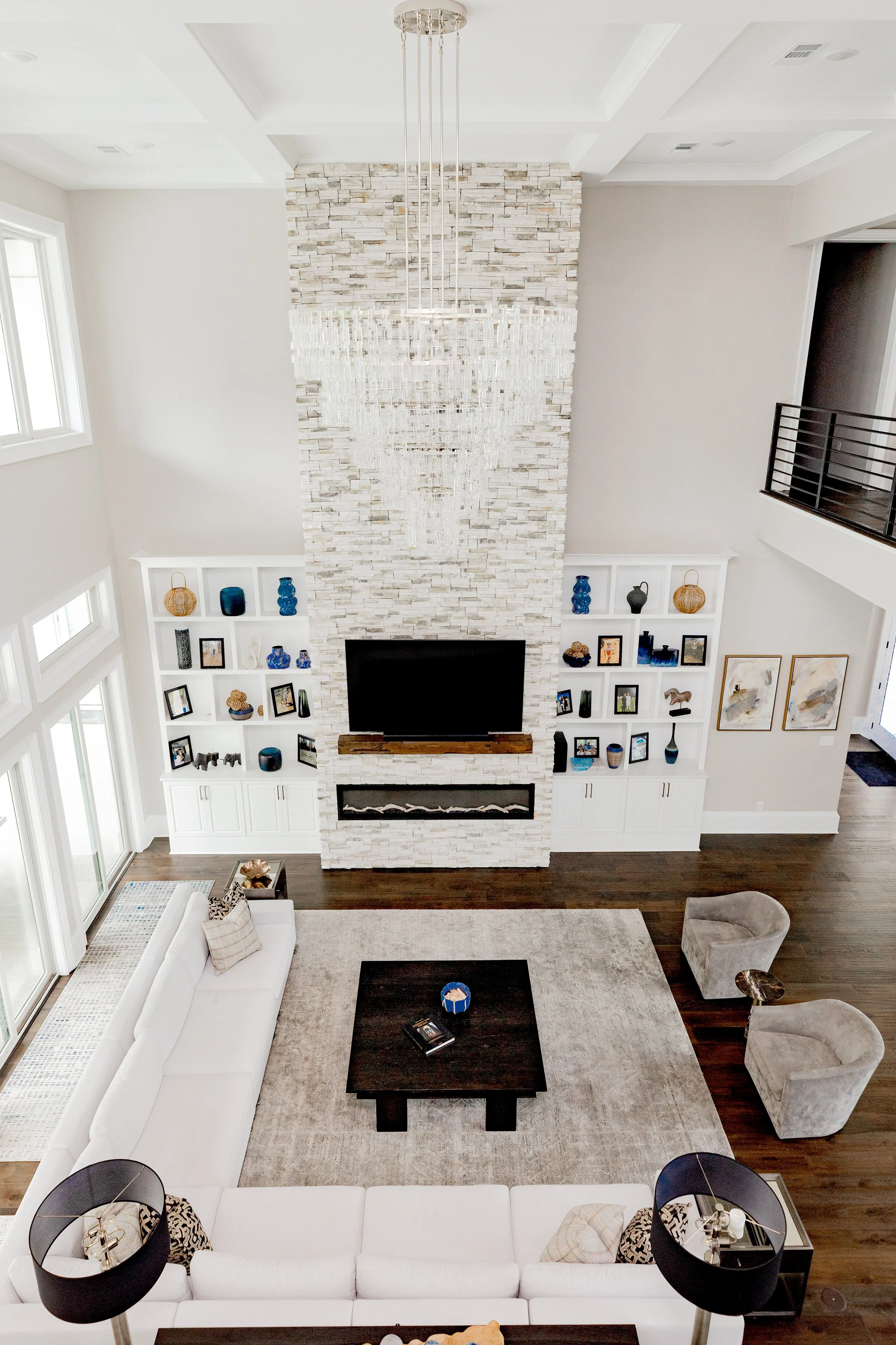 A beautifully layered living room designed to balance comfort, style, and everyday living. Thoughtful furniture placement, layered textures, and custom finishes create a space that is both functional and inviting for entertaining or quiet family mome