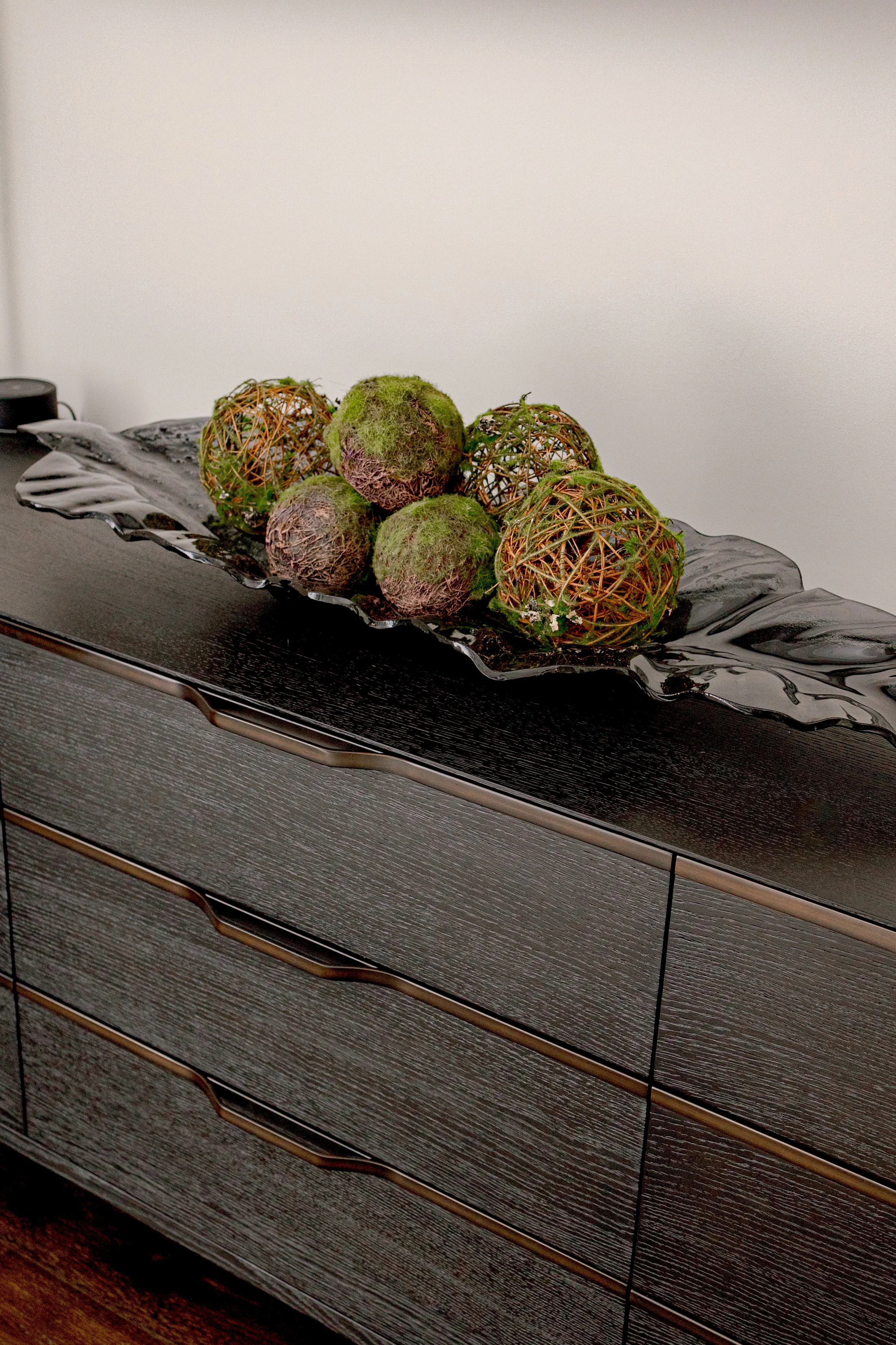 A serene master bedroom retreat designed to feel calming, refined, and restorative. Custom bedding, tailored window treatments, and motorized shades create a luxurious yet peaceful environment. Soft textures and intentional layering support daily com