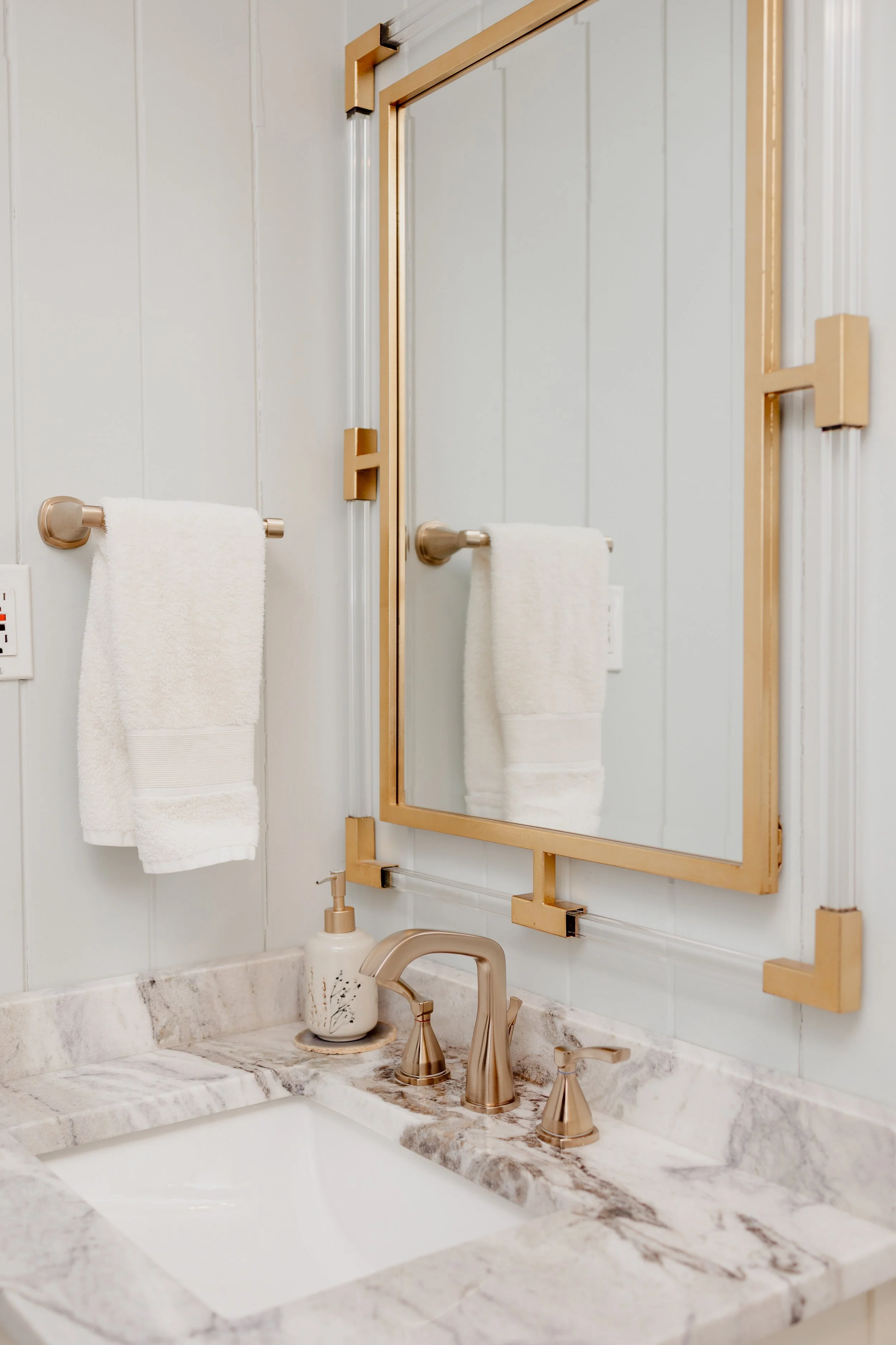 A renovated bathroom at the Gilmer Cottage showcasing clean, modern finishes that complement the home’s timeless charm. Thoughtful design and elevated materials make this space both functional and beautifully styled by Cossart Design.
#BathroomDesign