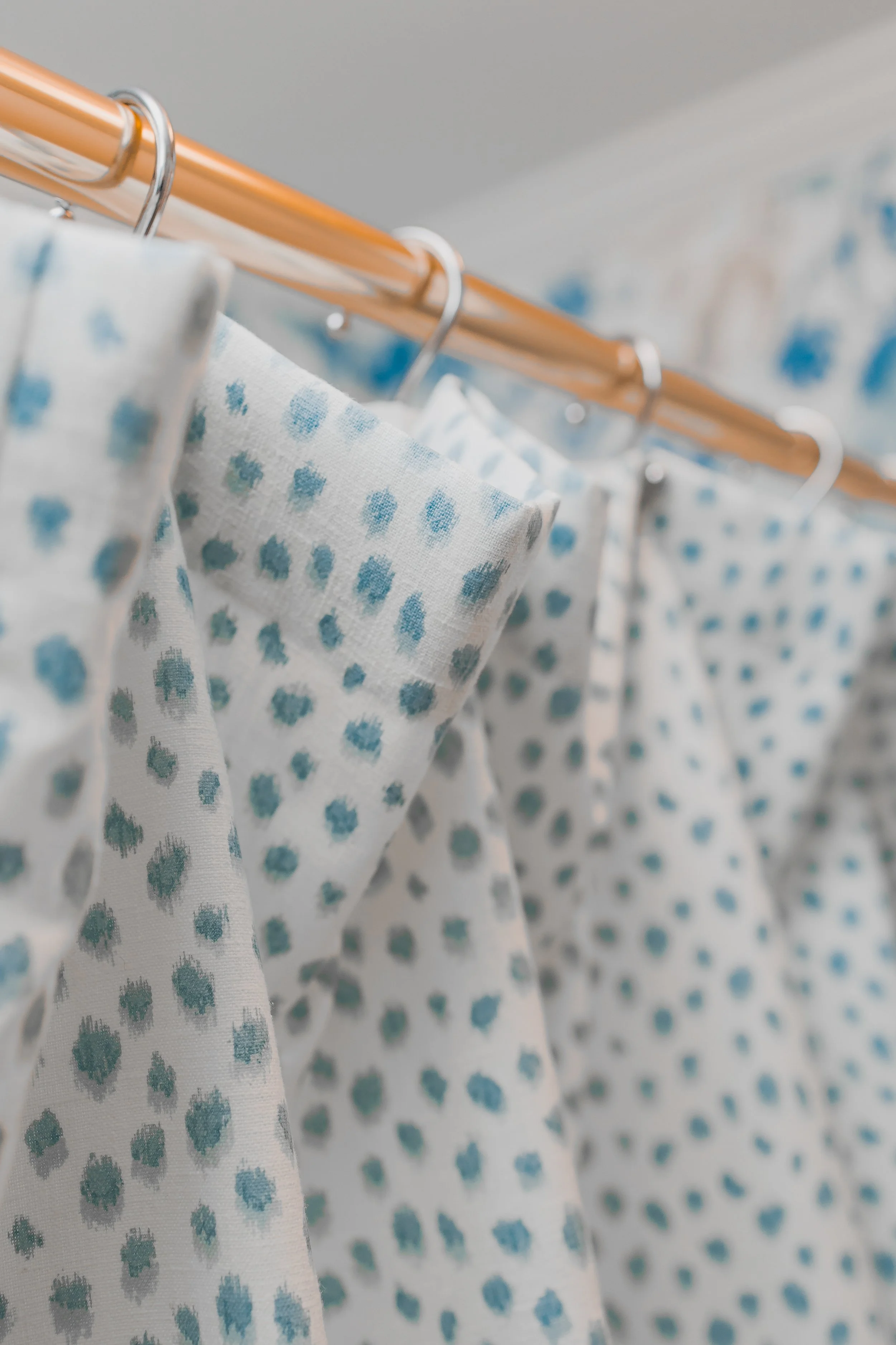 A luxurious custom bathroom designed by Cossart Design, featuring gold fixtures, elegant wallpaper and finishes, and bespoke window treatments. The space is designed for comfort and style, creating a functional yet elevated retreat within the home.
#