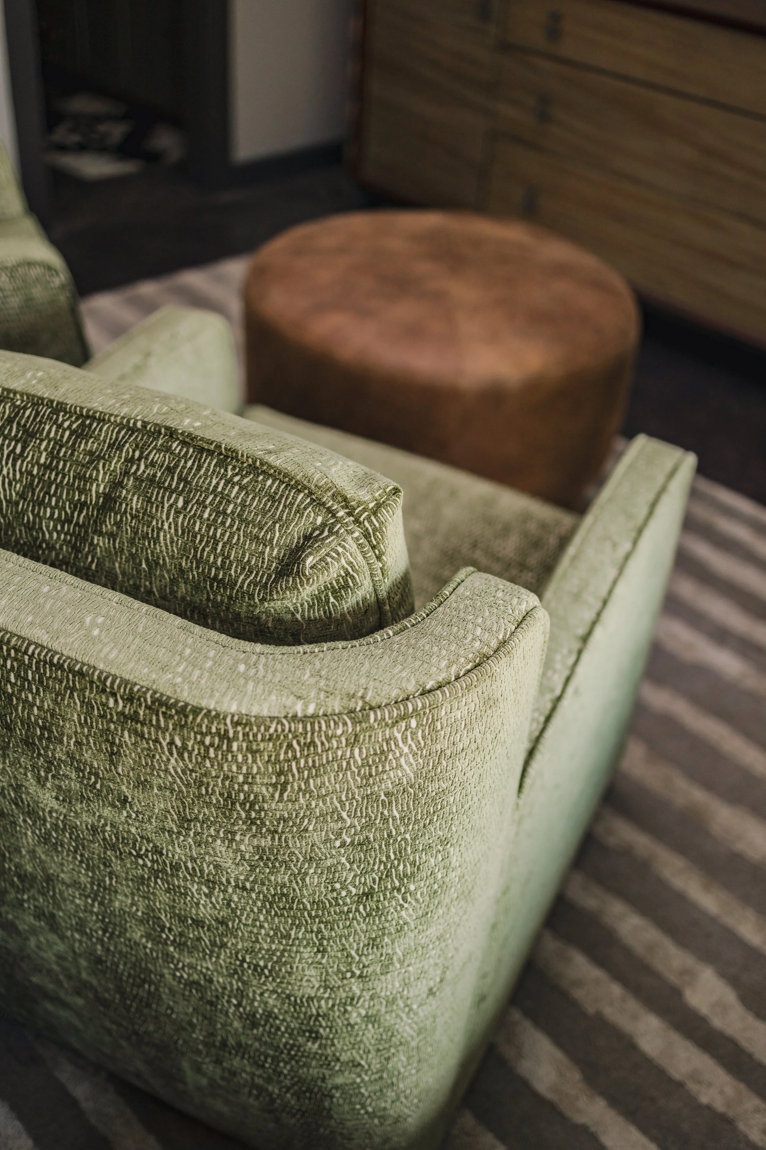 Close-up detail shots from the John Cobb Barndominium by Cossart Design showcase the craftsmanship, textures, and custom finishes that define this elevated hunting lodge-inspired home. From bespoke furnishings and layered textiles to industrial accen