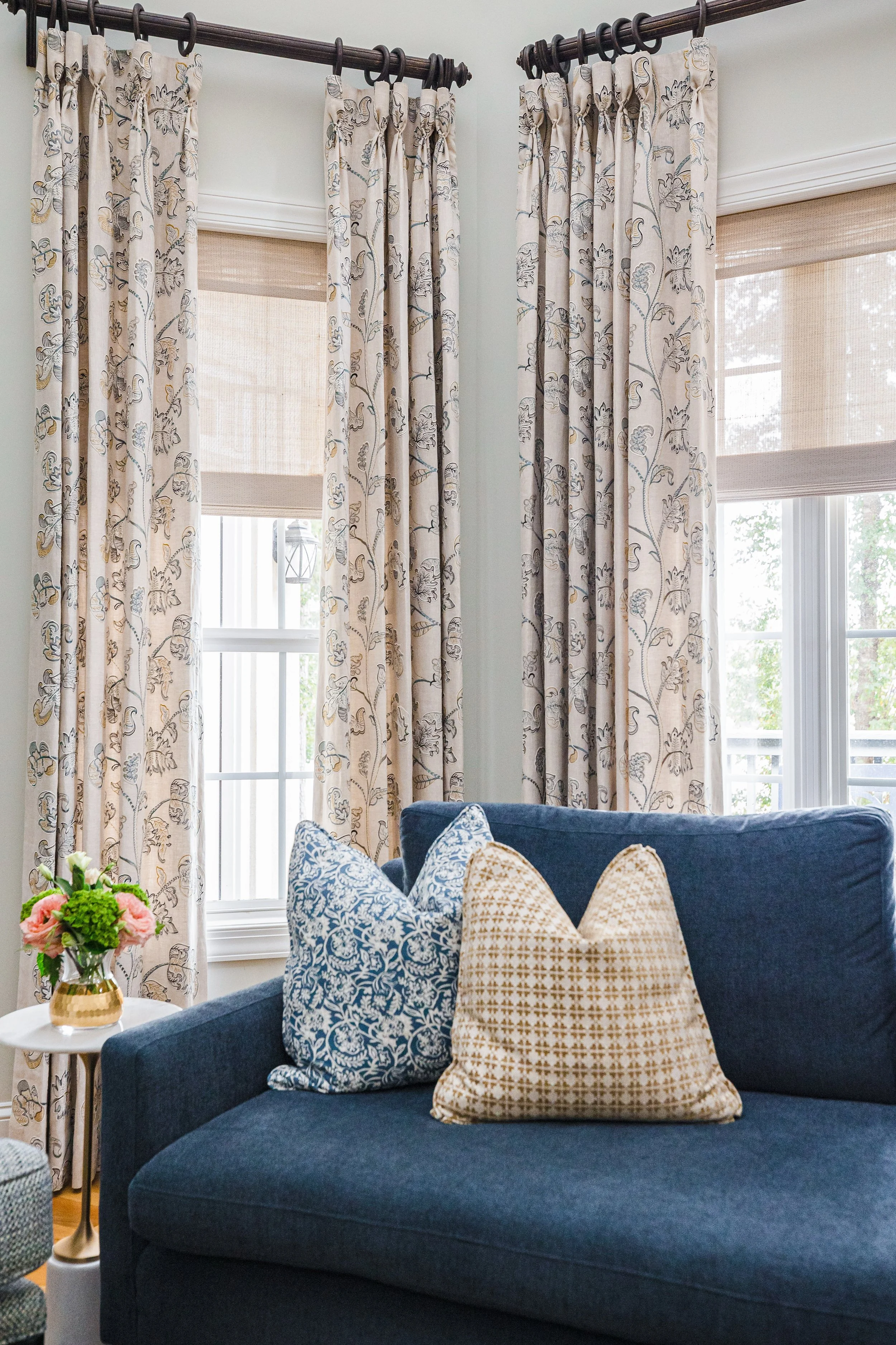 A quintessential Southern formal living room by Cossart Design, blending classic elegance with modern comfort. Warm tones, layered textures, and tailored furnishings create a welcoming space for entertaining or quiet afternoons. Thoughtful accents an