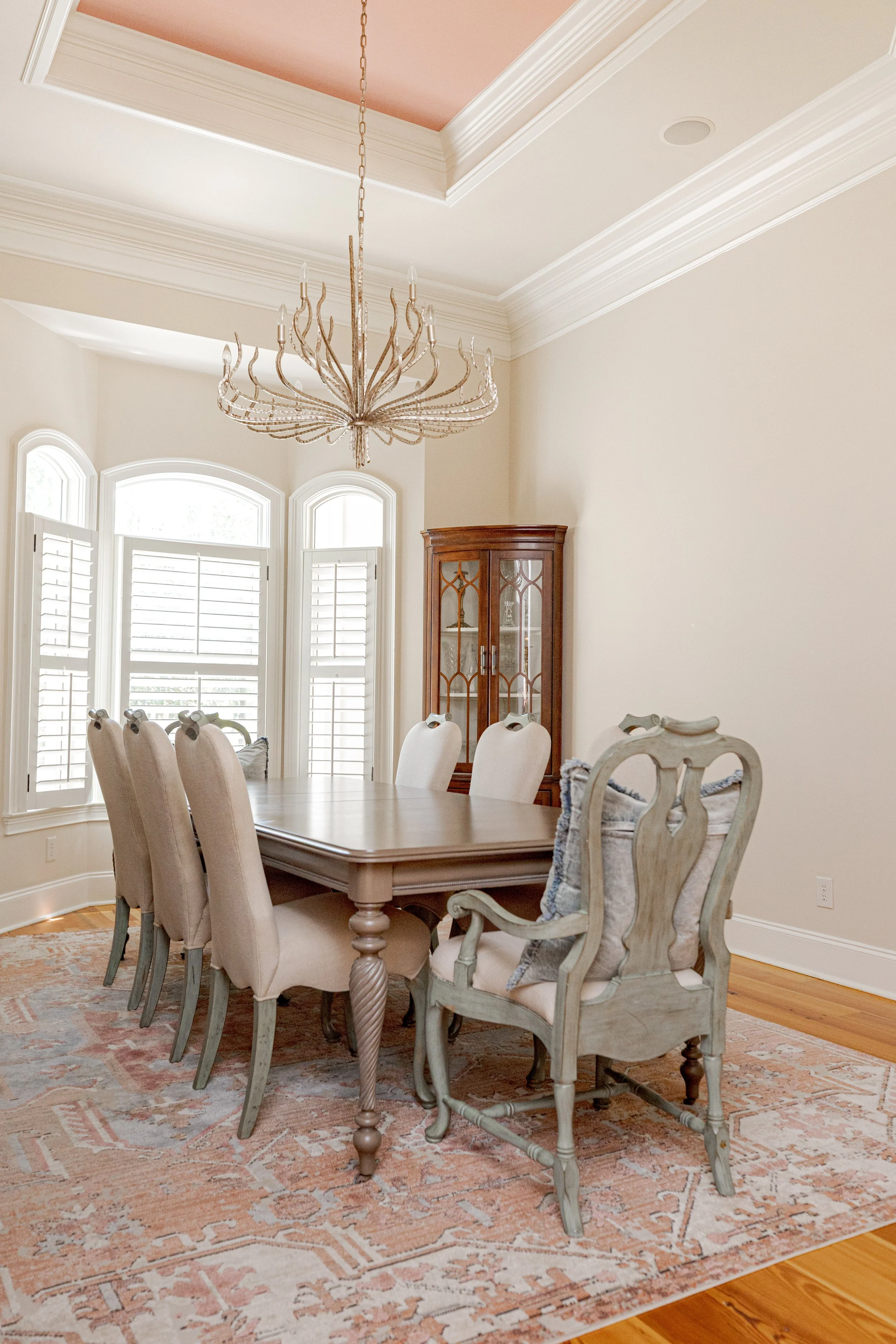 This formal dining room was designed to feel timeless, welcoming, and ideal for gathering. Thoughtful furniture placement, layered textures, and classic design elements create a space that feels elevated yet comfortable for hosting both intimate dinn