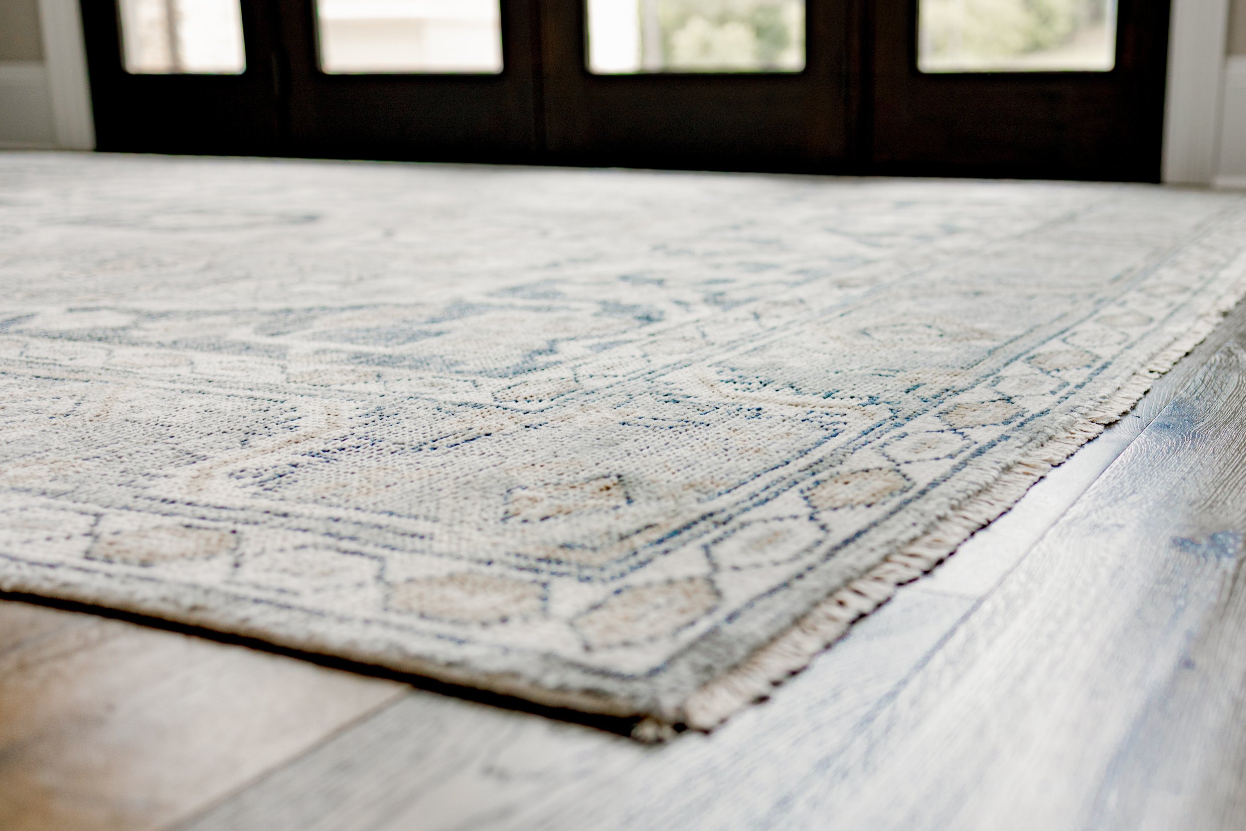 A welcoming entry designed to set the tone for the entire home. Clean lines, intentional styling, and balanced proportions create a refined first impression while inviting guests inward. This space reflects cohesive interior design that feels elevate