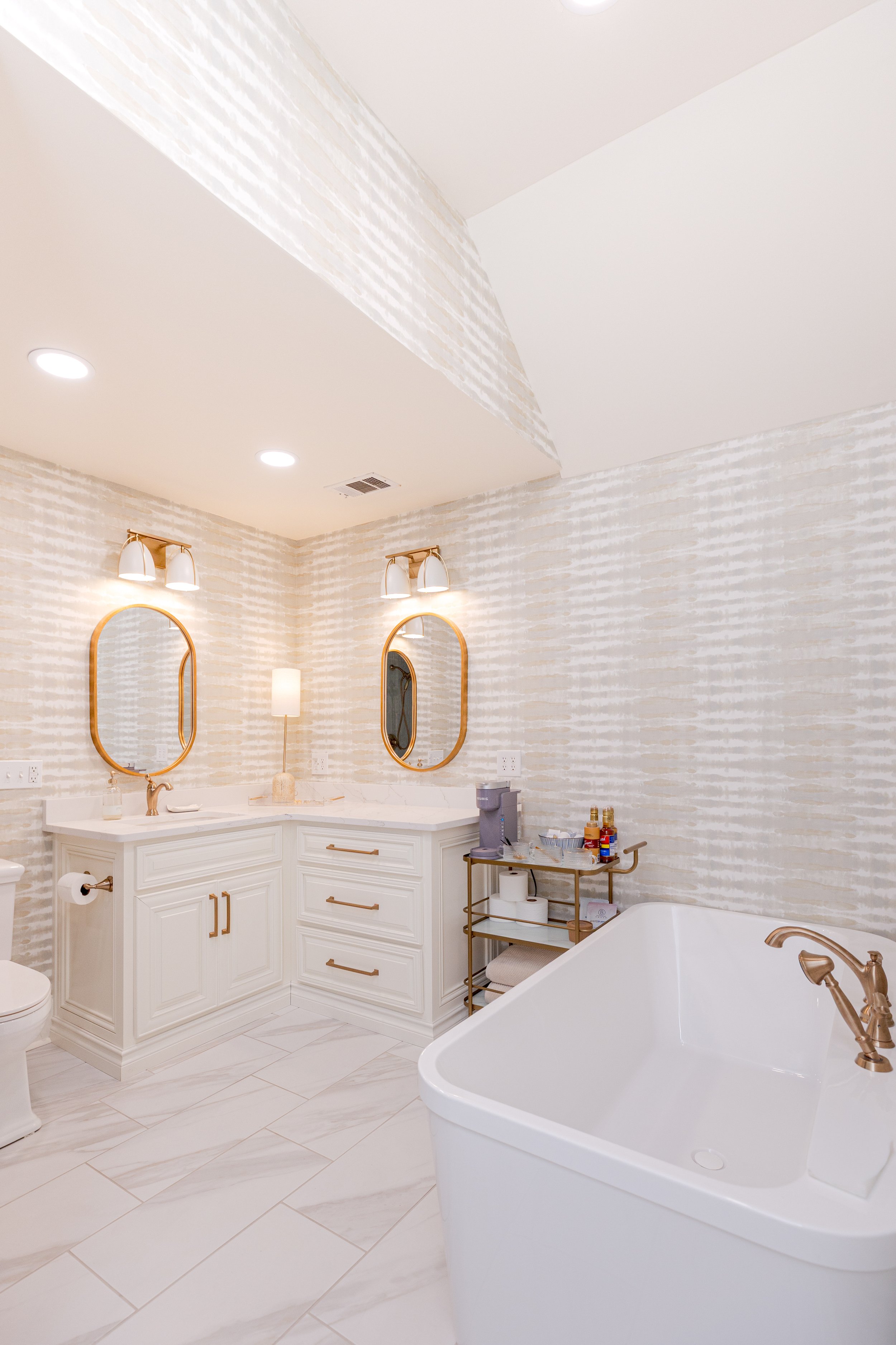 A private en-suite bathroom designed as a personal retreat, where custom selections and elevated finishes create a sense of quiet luxury. Thoughtful layouts, tailored vanities, and refined materials come together to deliver both beauty and function i