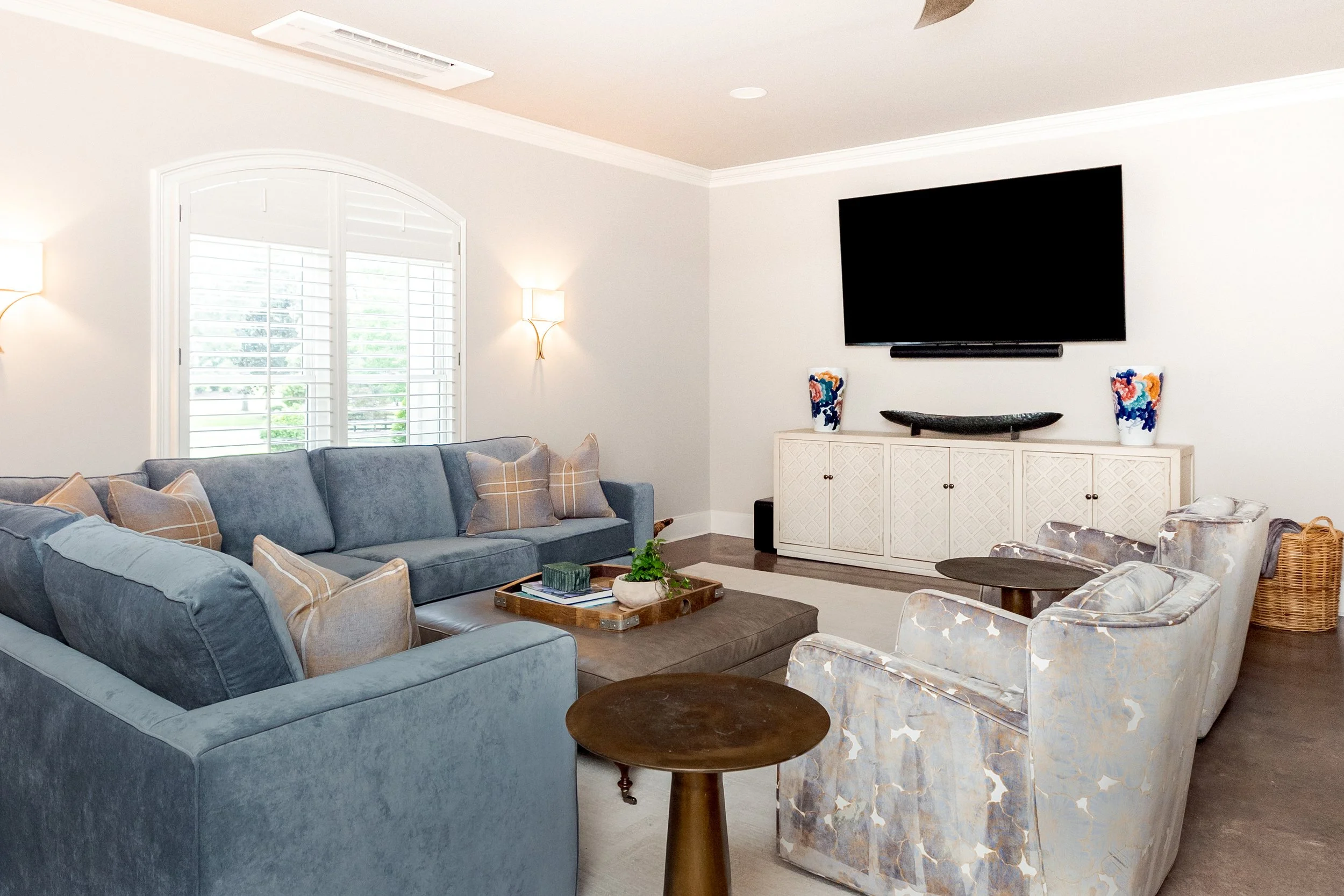 An inviting main living space layered with natural textures, warm wood tones, and classic finishes. Designed to support real life, this space feels connected, comfortable, and effortlessly refined.

#InteriorDesign #MainLivingSpace #OpenConceptLiving