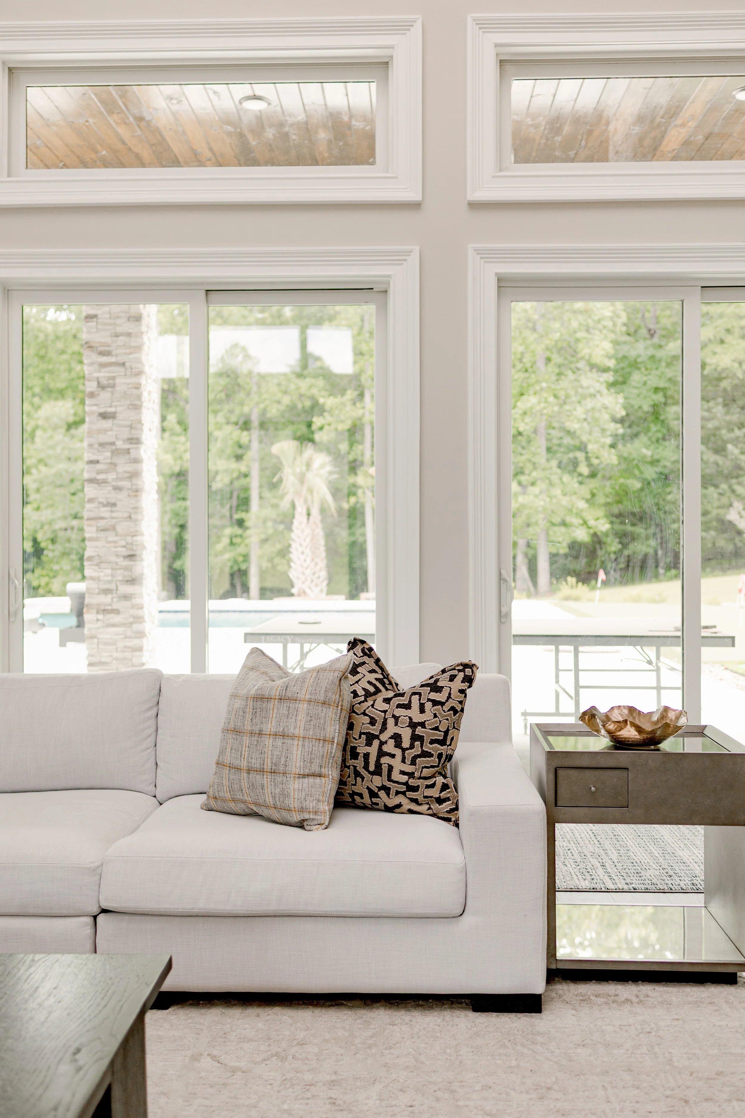 A beautifully layered living room designed to balance comfort, style, and everyday living. Thoughtful furniture placement, layered textures, and custom finishes create a space that is both functional and inviting for entertaining or quiet family mome