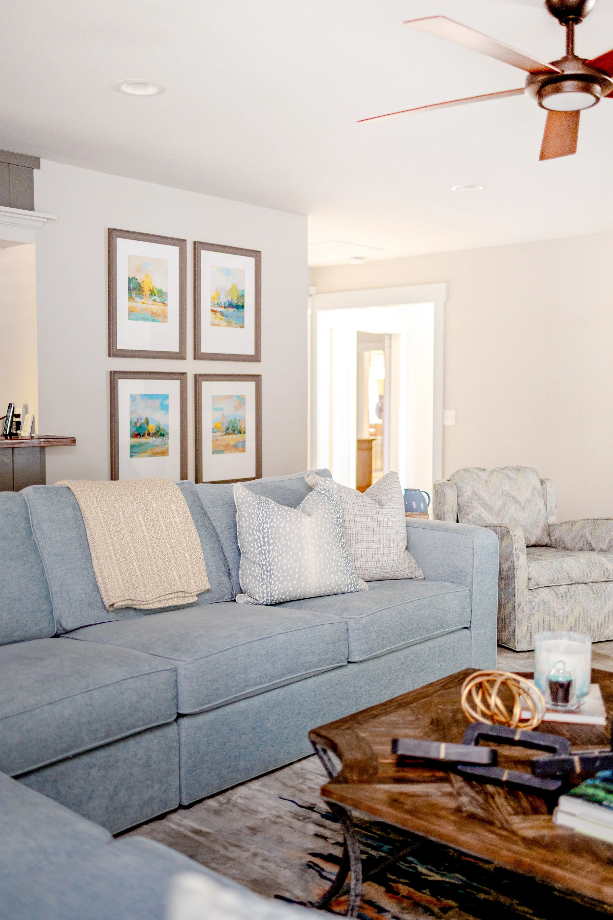 Beautiful interior living room designed by Cossart Design, a premier home interior design company in Perry, GA, proudly serving Warner Robins, Macon, Kathleen, and Middle Georgia #InteriorDesign #HomeDesign #TimelessDesign #christinaelmorephotography