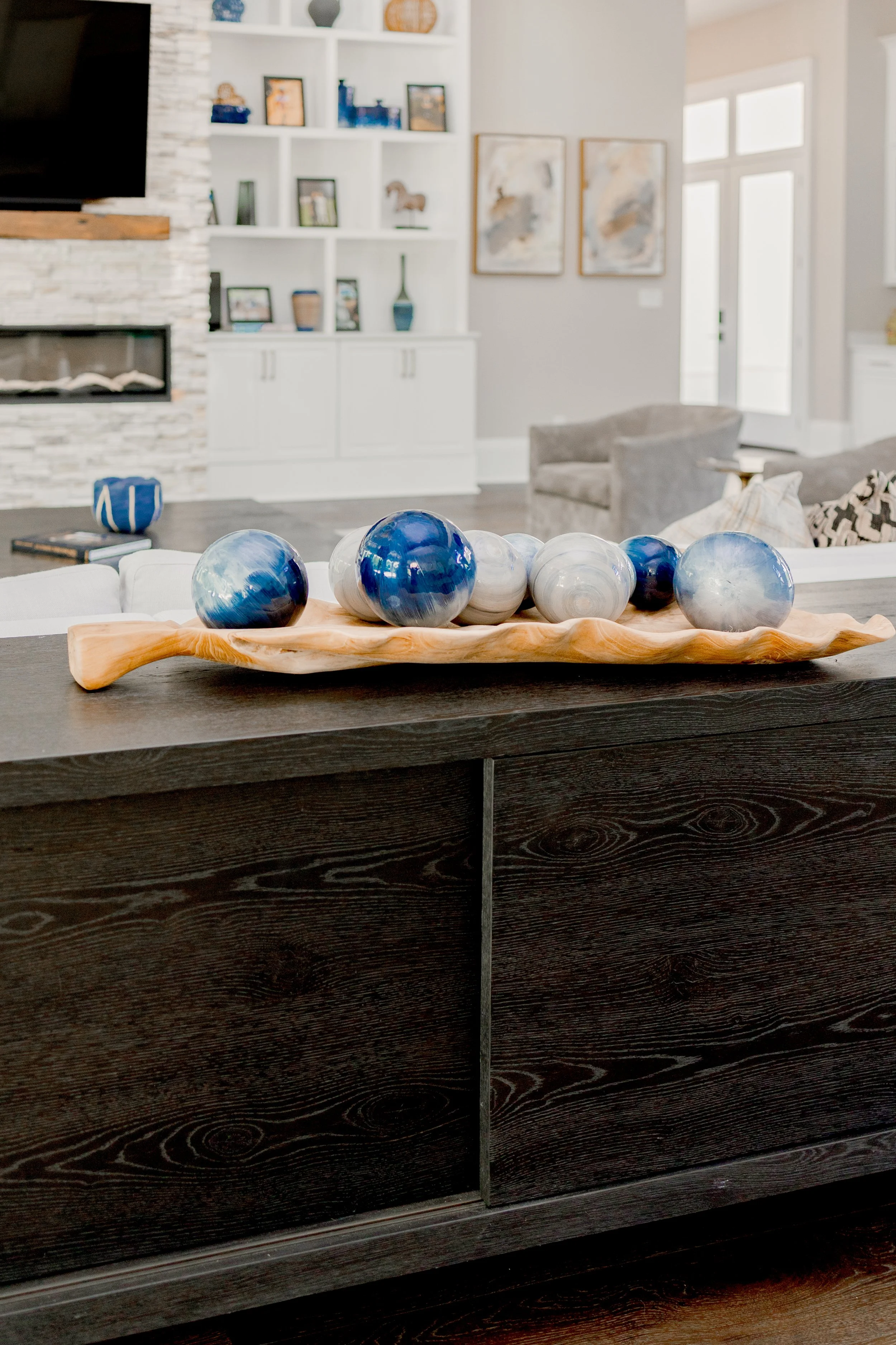 Thoughtfully selected custom design elements bring personality, function, and elevated detail to every corner of the home. From tailored lighting and mirrors to bespoke barware and decorative accents, each piece was curated to complement the space an