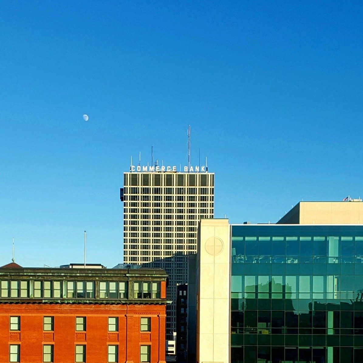 Commerce Bank Tower is a residential and commercial center for downtown Kansas City, Missouri. It reaches 421 ft (128.3m) and has a distinct "COMMERCE BANK" sign that lights up on both sides of the building as well as the green logo that fa