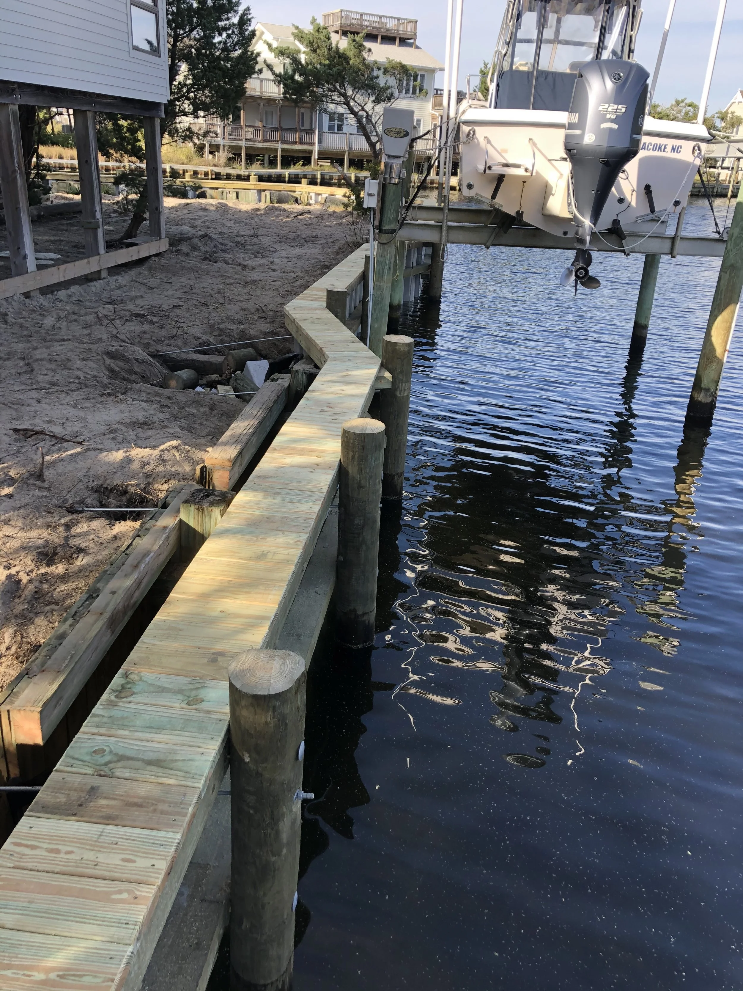 vinyl bulkhead in Colington Harbour, NC with a 1.5 ft. topcap