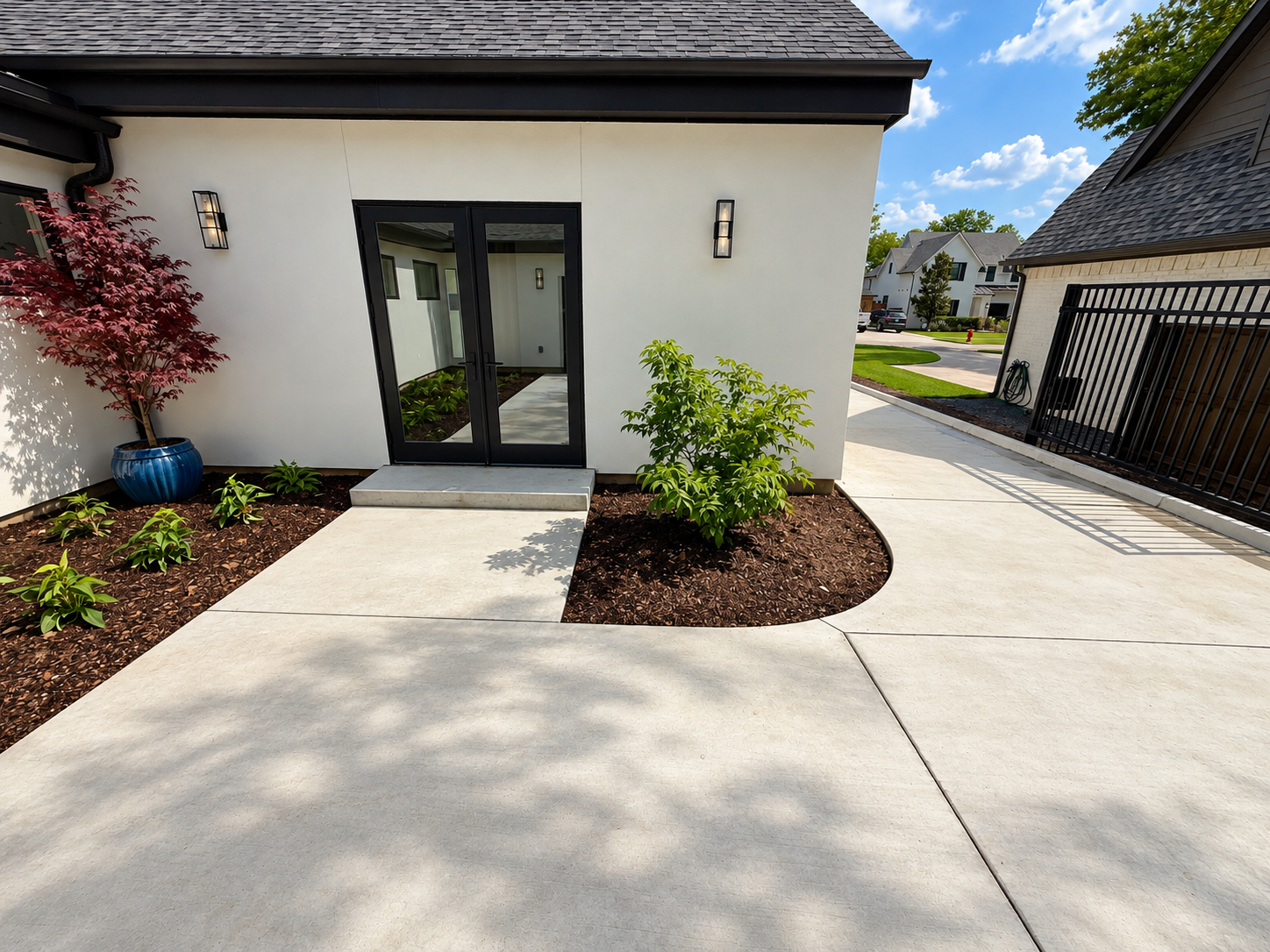 Modern Home Entry with Landscaped Walkway.png