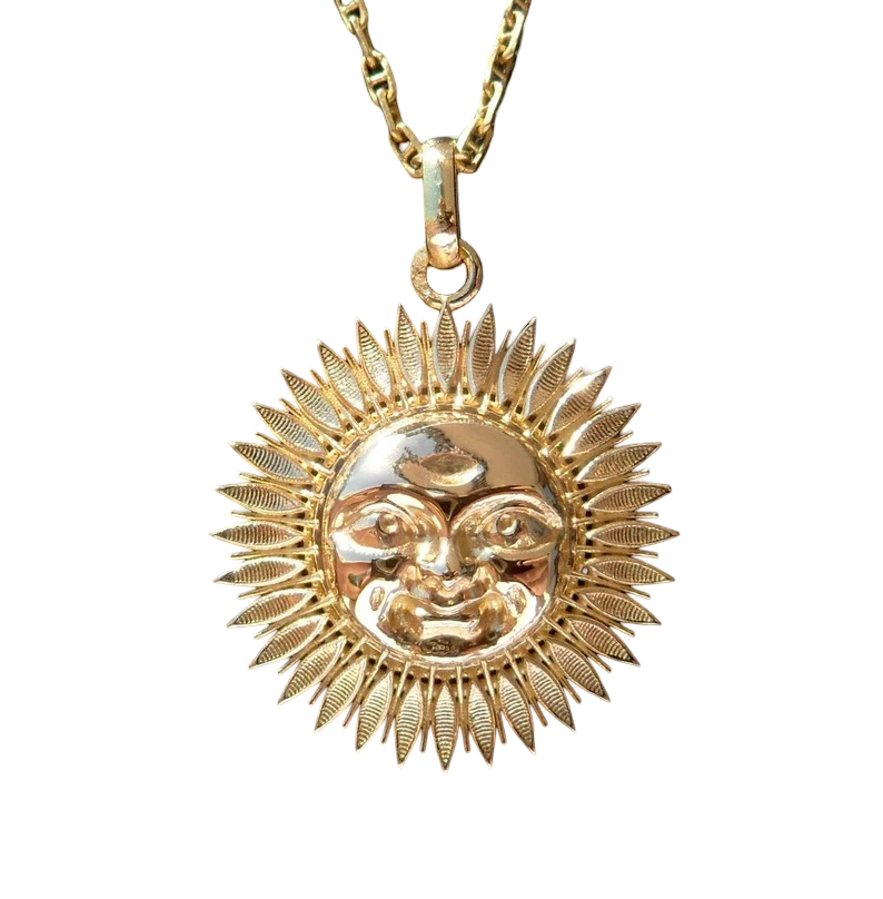 Charm/pendentif Luck sun , or 18 carats