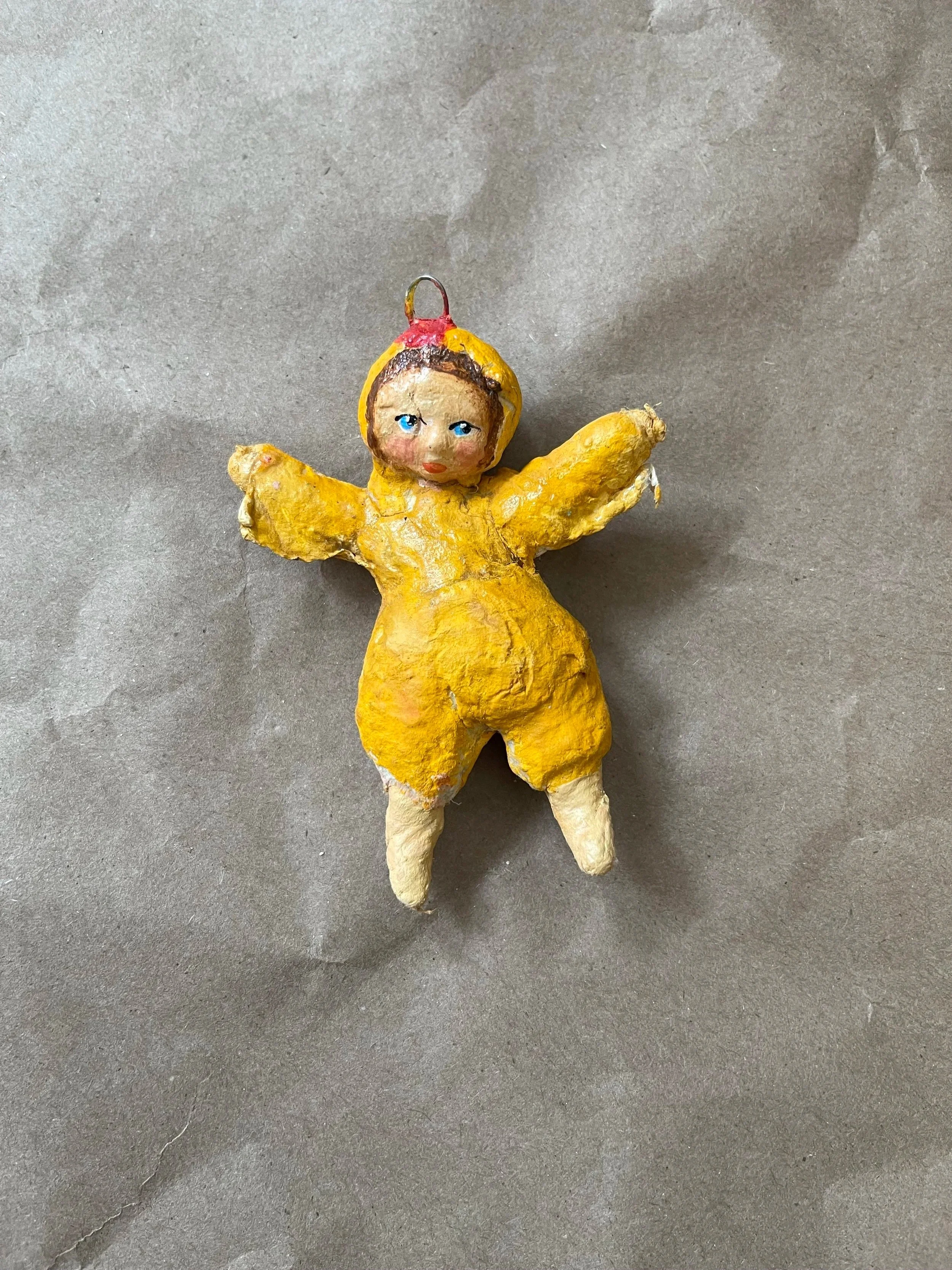 Russian spun-cotton child in a chicken costume.
