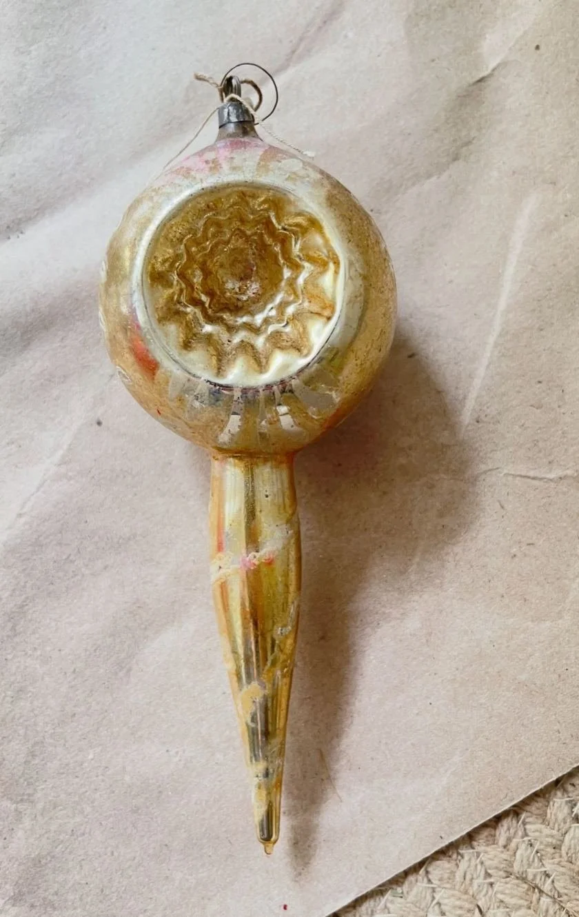 Vintage icicle-style ornament with cap, loop, long neck, and molded glass form