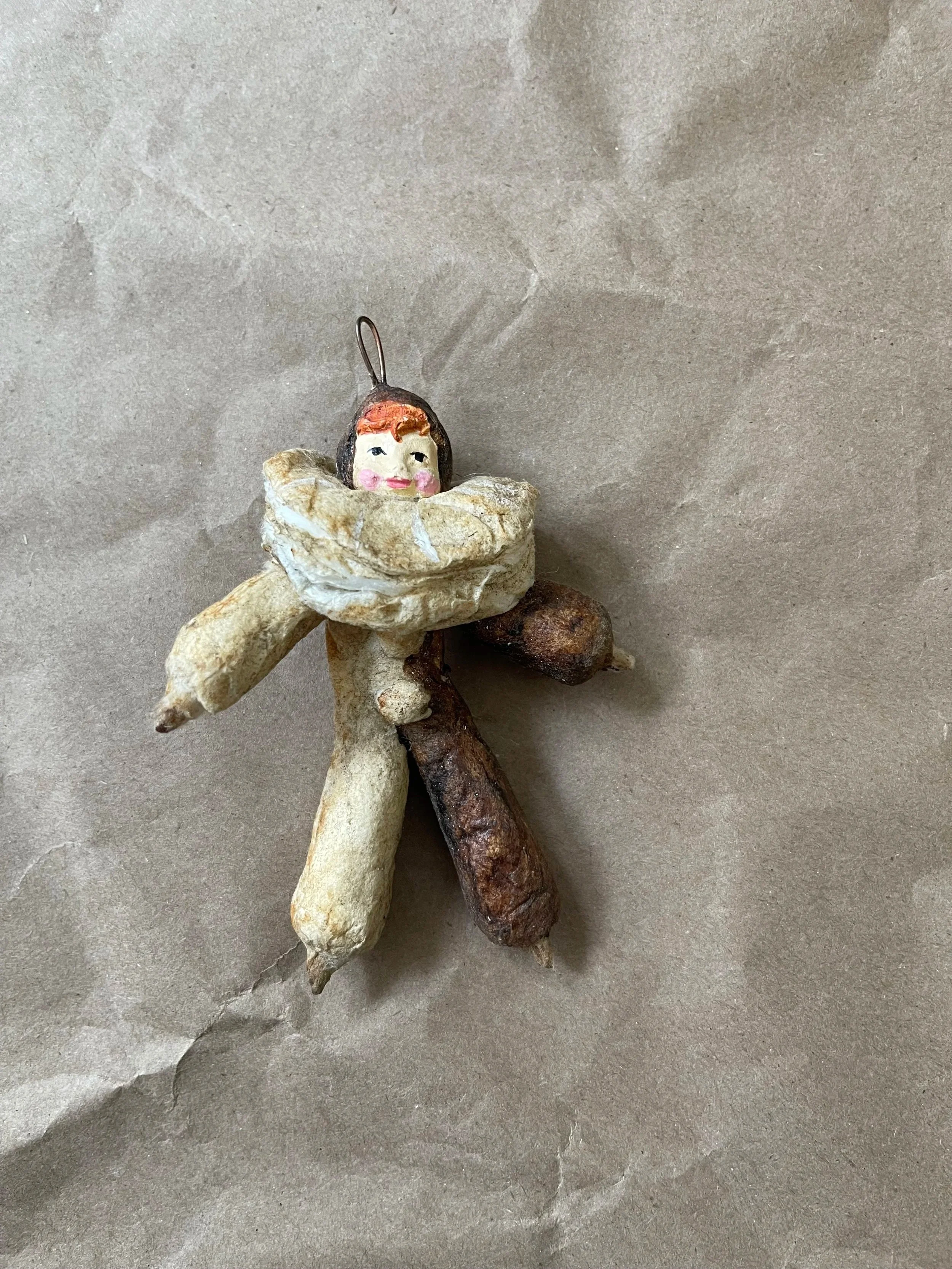 Russian spun-cotton child figure.