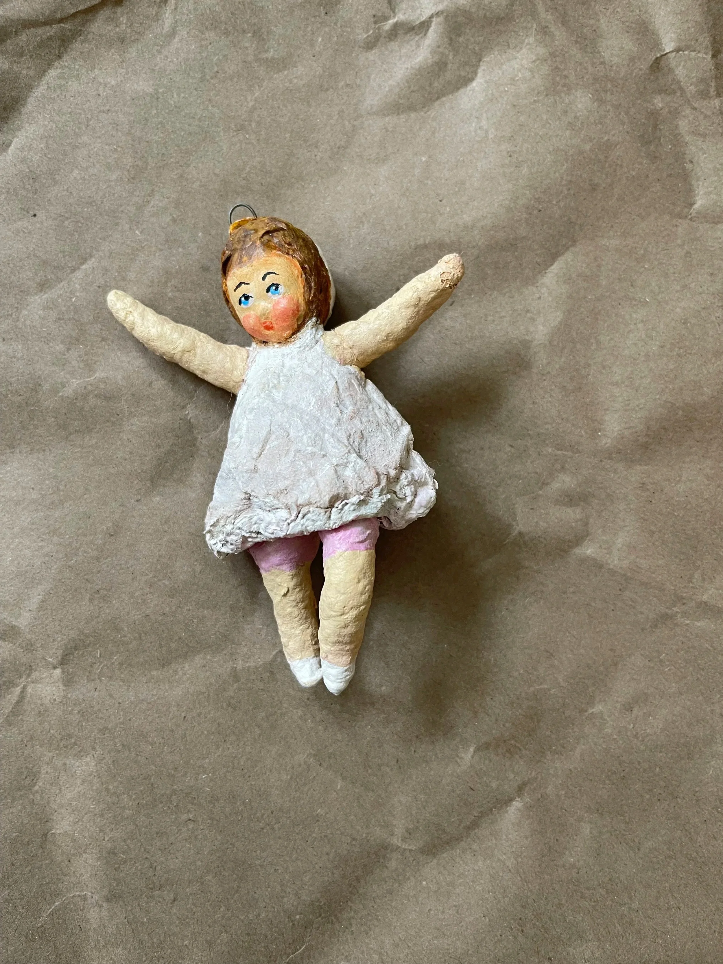 Russian spun-cotton girl ornament.