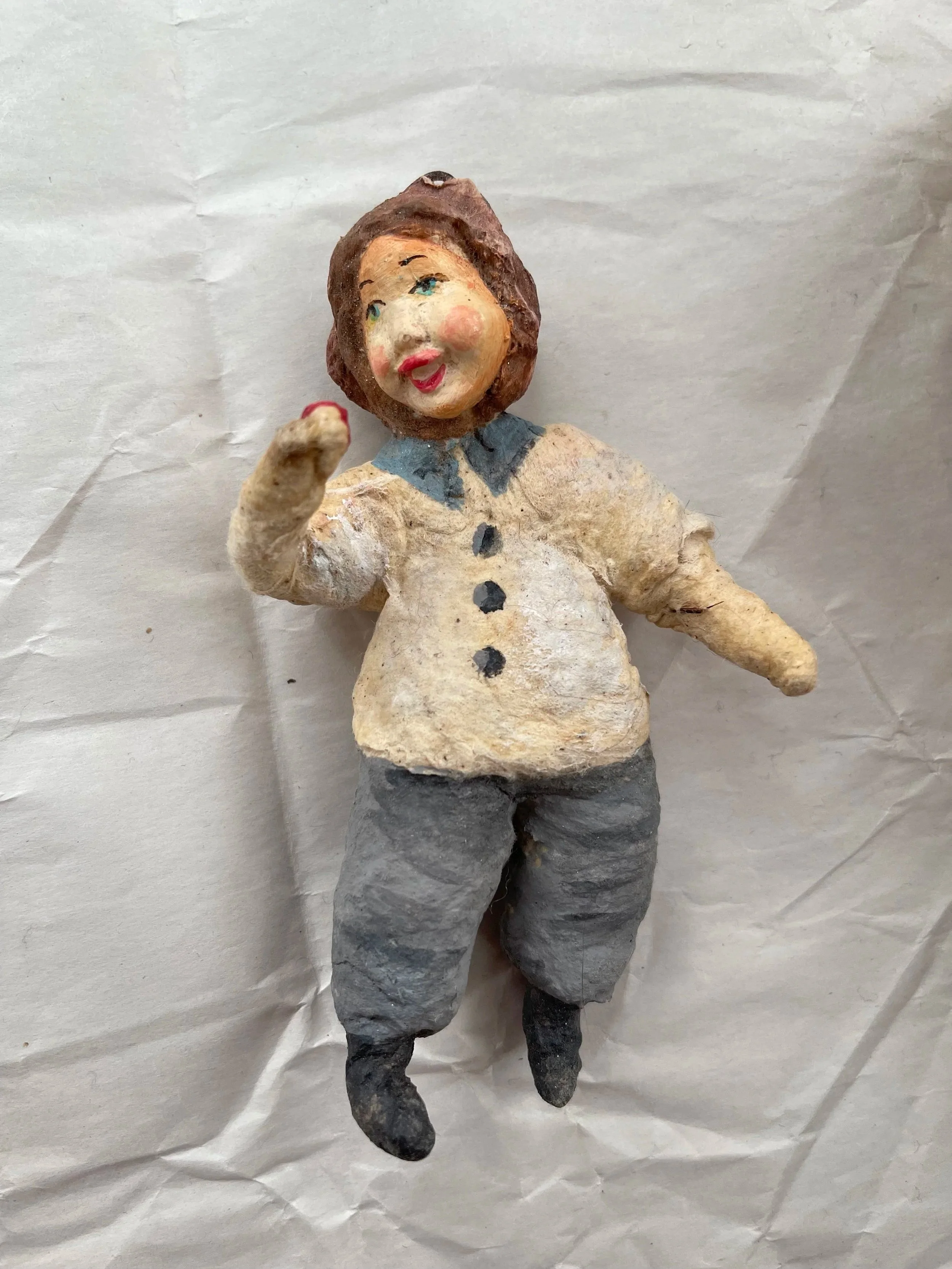 Antique spun-cotton farm boy ornament.