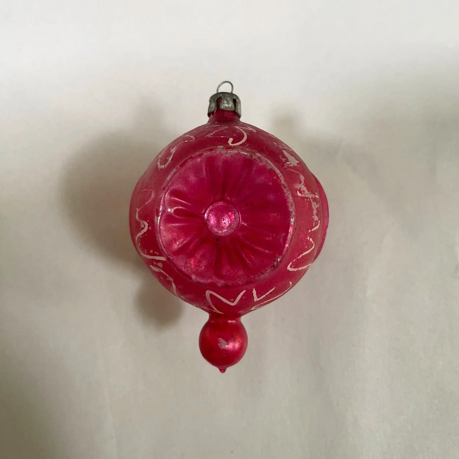 Antique German red triple-indent glass Christmas ornament.