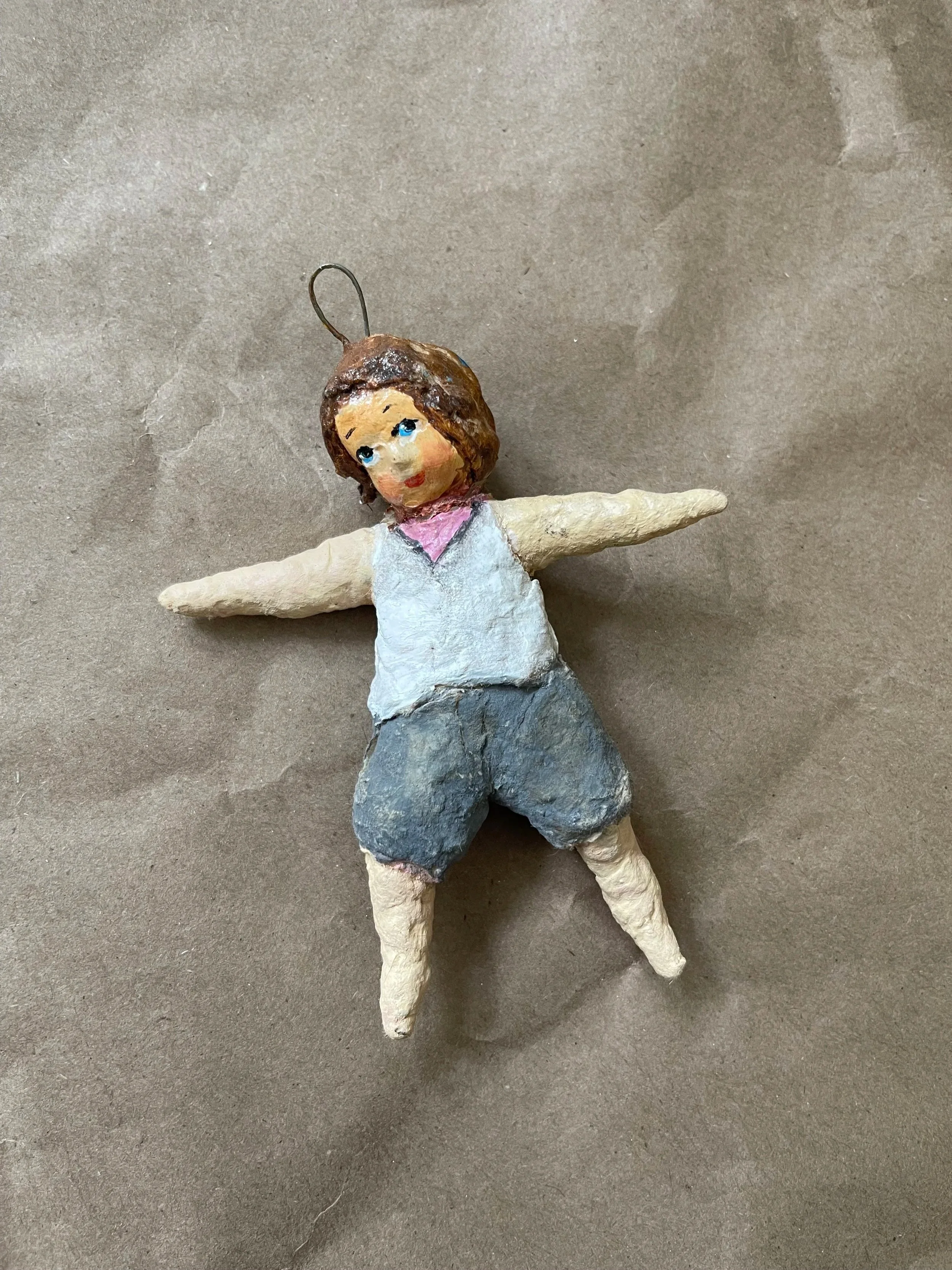Russian spun-cotton child figure ornament.
