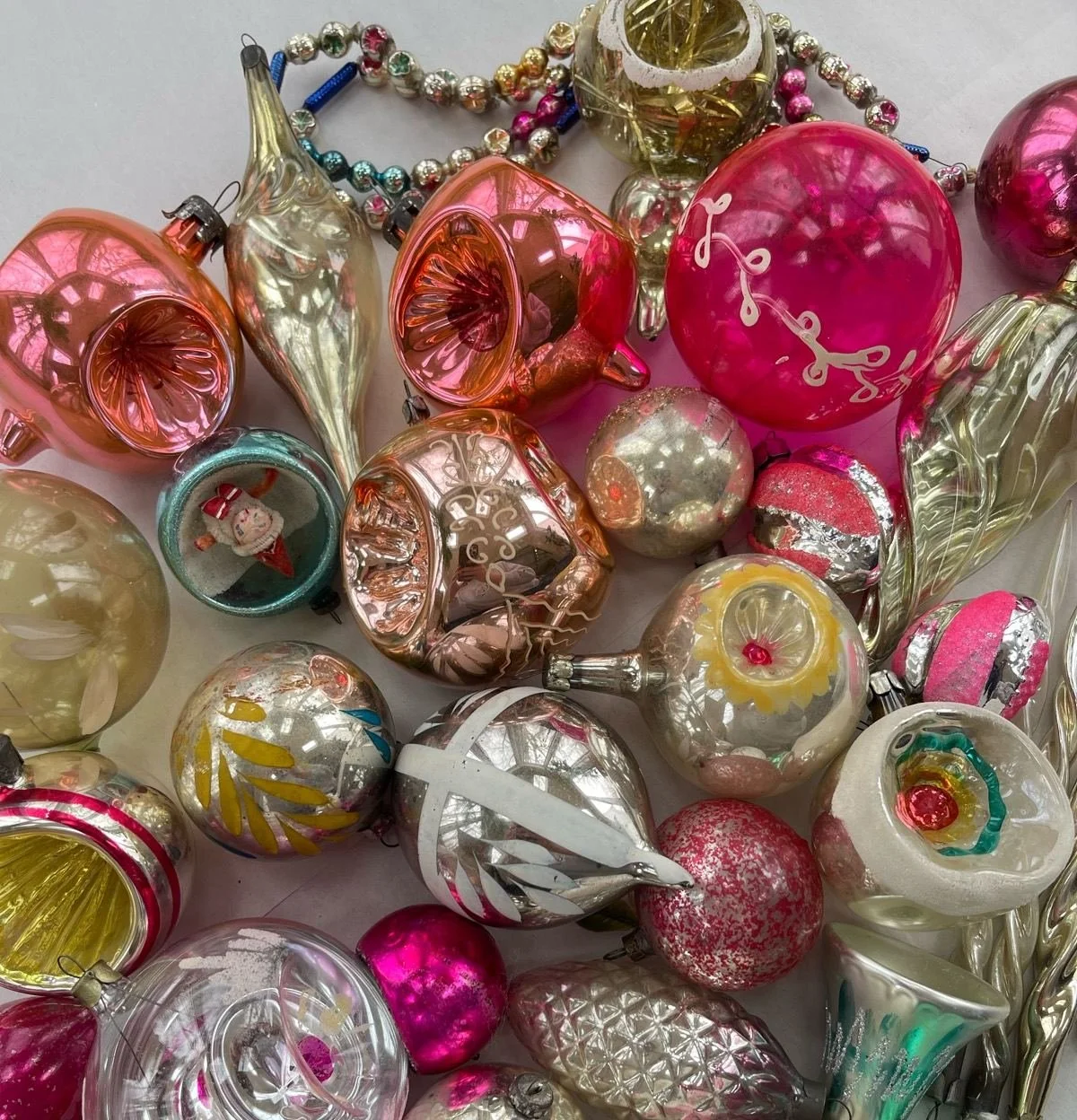 Vintage glass indents, icicles, bead garland, silvering, and painted details