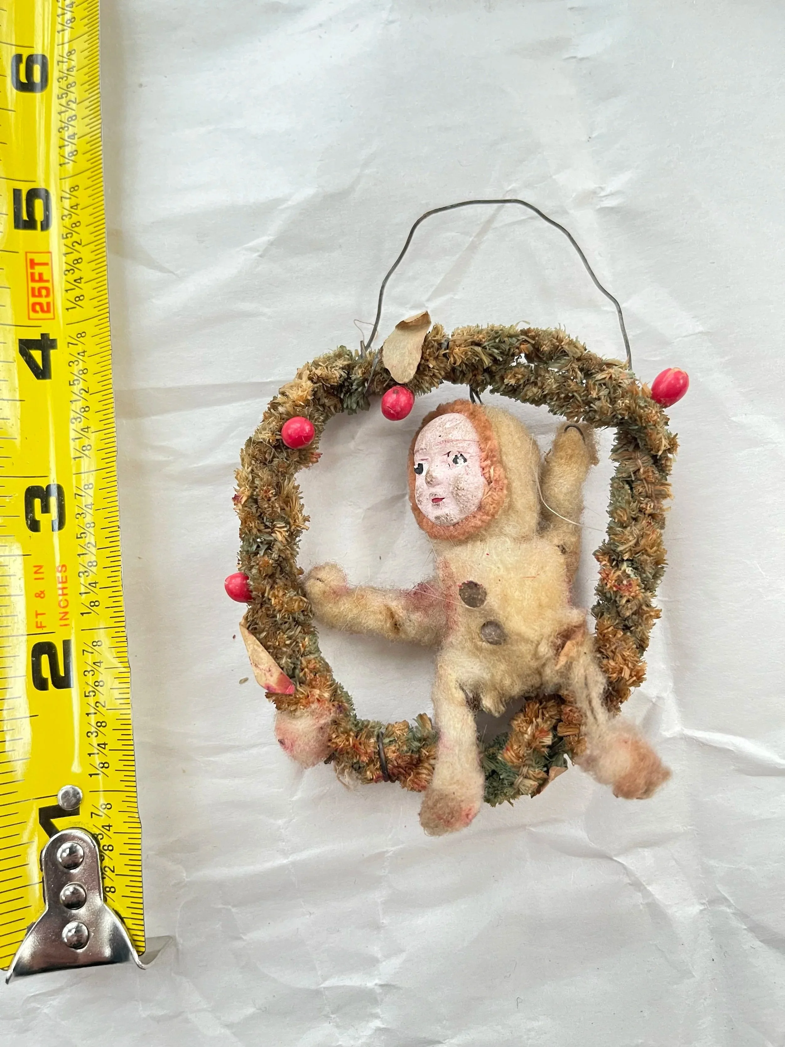 Spun Cotton Figure on Tinsel Wreath.