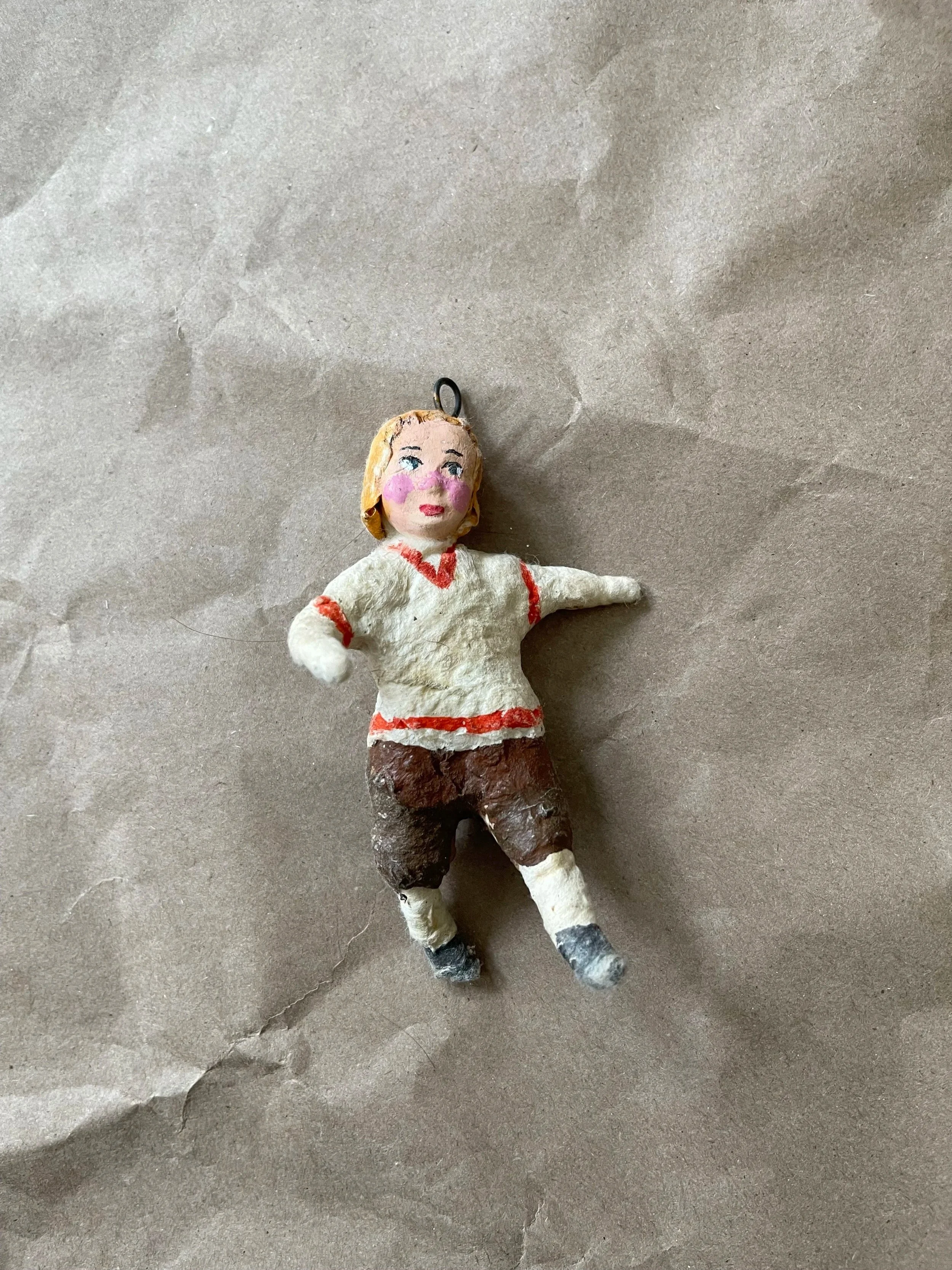 Russian spun-cotton child figure ornament.