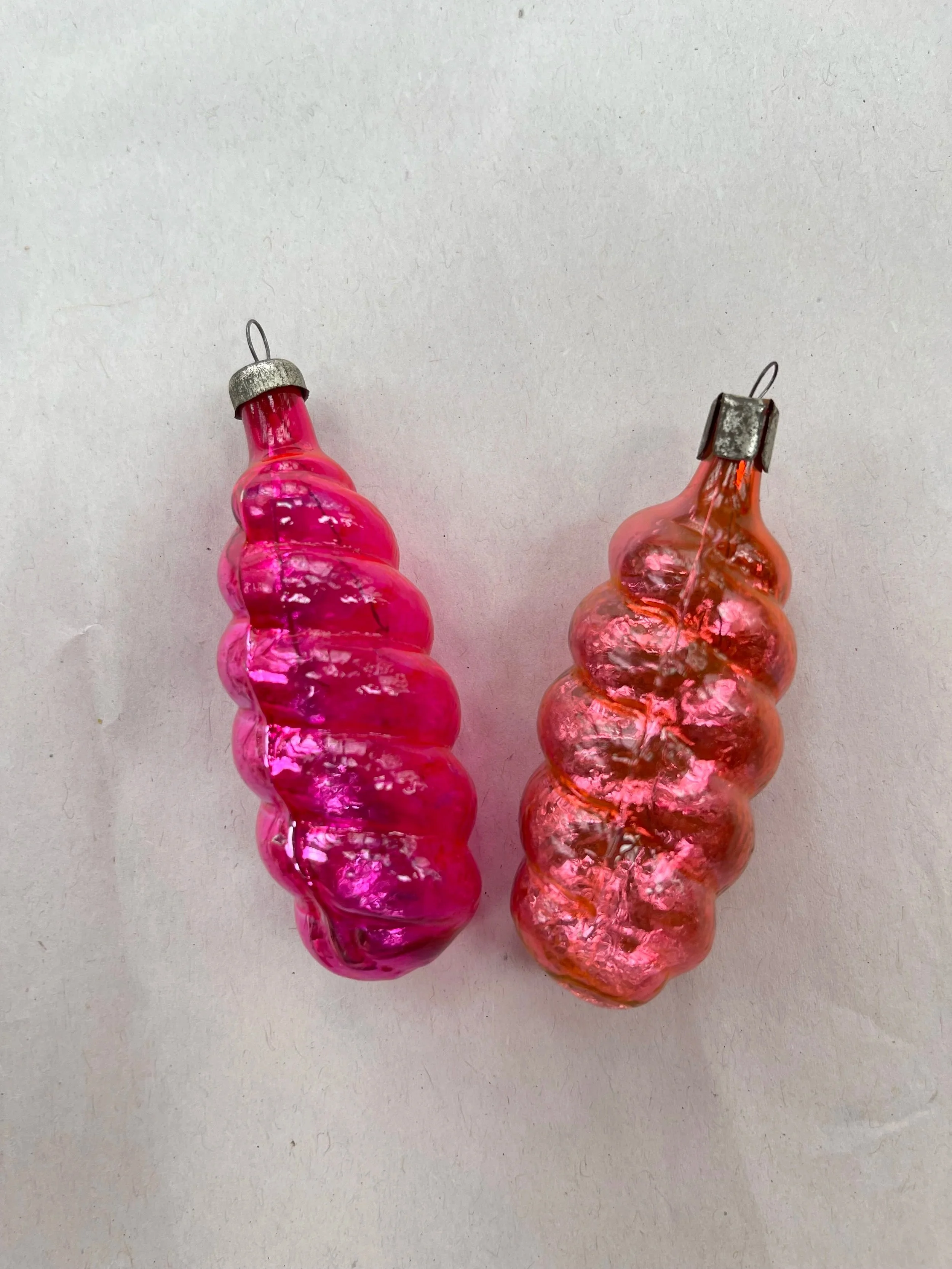 Two USSR Pink Swirl Ornaments.