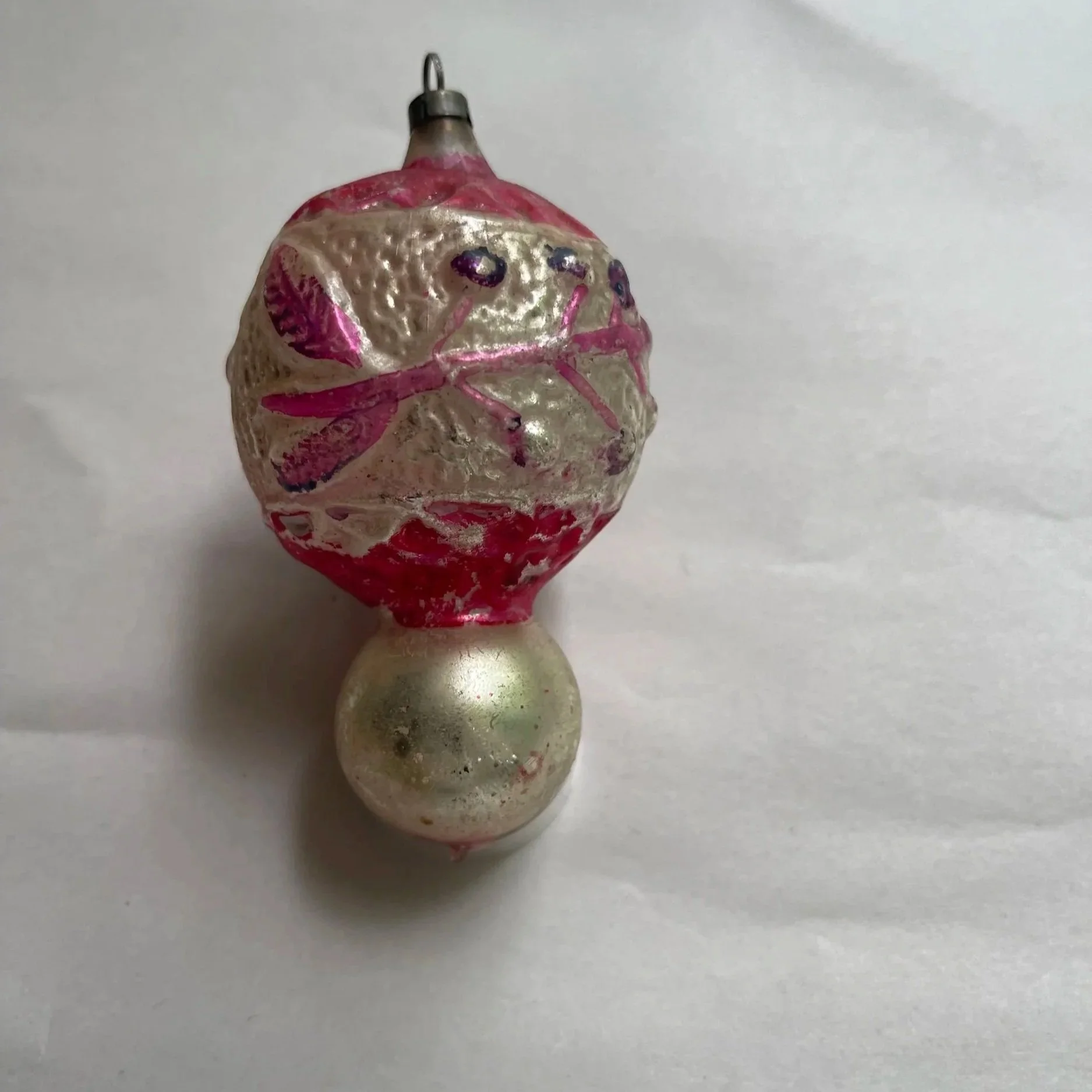 Antique German blown-glass double-ball ornament with a silvered globe, pink floral decoration, and small lower ball.