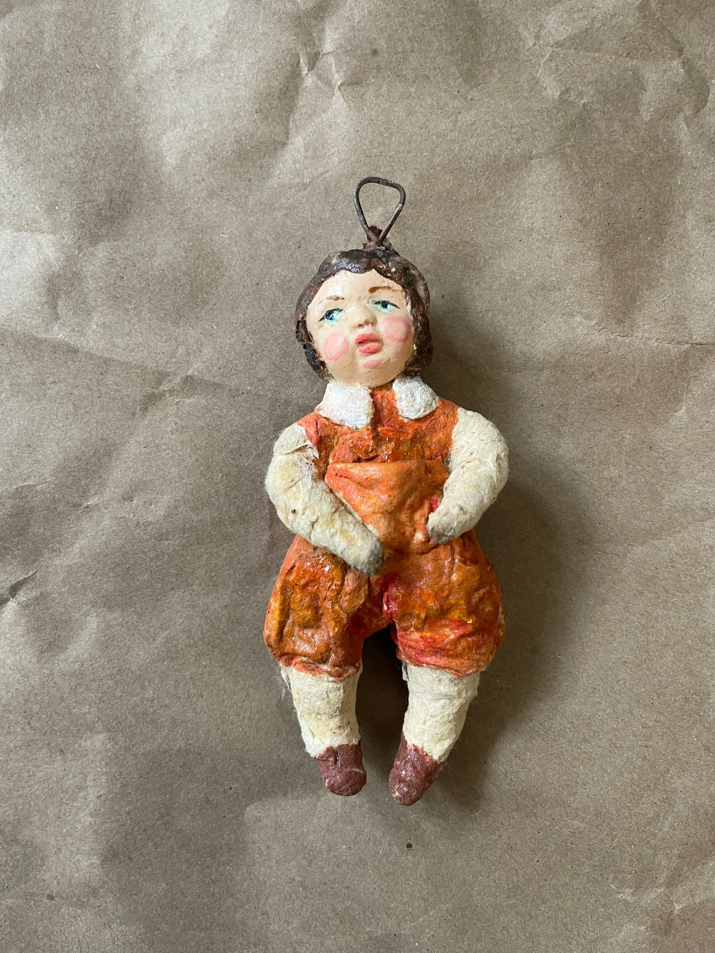 Russian spun-cotton child figurine.