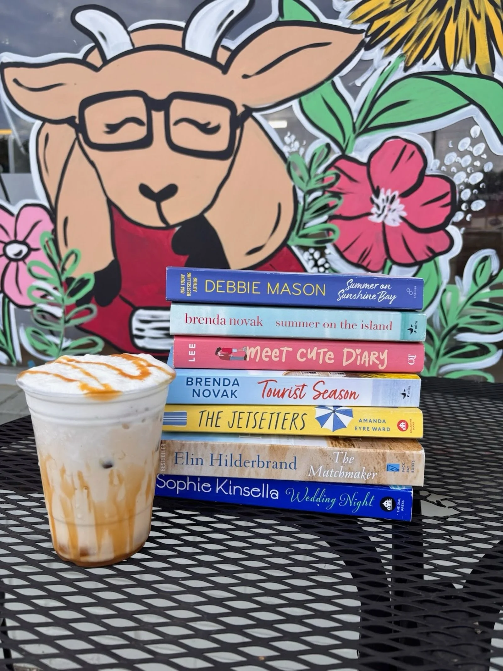 Hot days call for cold coffee and cute summer reads☀️⛱️ 

We are open until 6 today so stop in for a coffee and your next favorite book! 👀📚