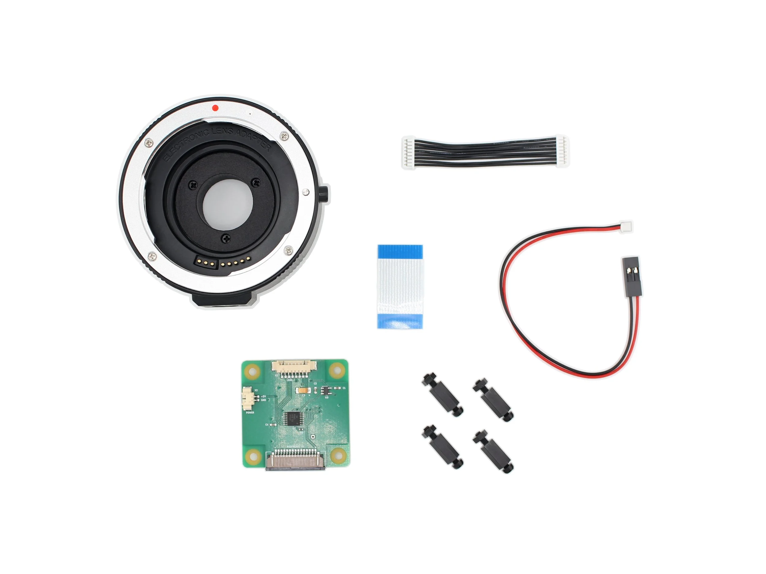 Package Contents: Canon EF / EF-S lens to C-mount camera adapter, The lens control board, Flex camera cable, 8-wire lens cable, 2-wire power cable, Accessory kit: standoﬀs, screws, and nuts