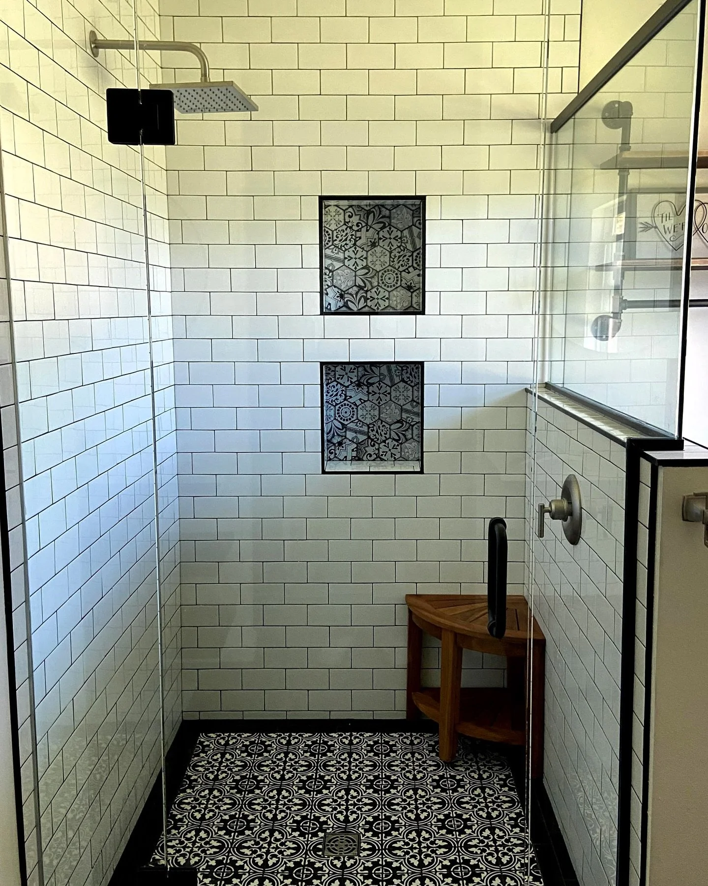 Highlighting this custom walk-in shower and bathroom remodel!! Placing the shower knob opposite of the shower head is small detail that is overlooked, saving you from getting wet while turning on the water. 

This unique shower features a matching pa