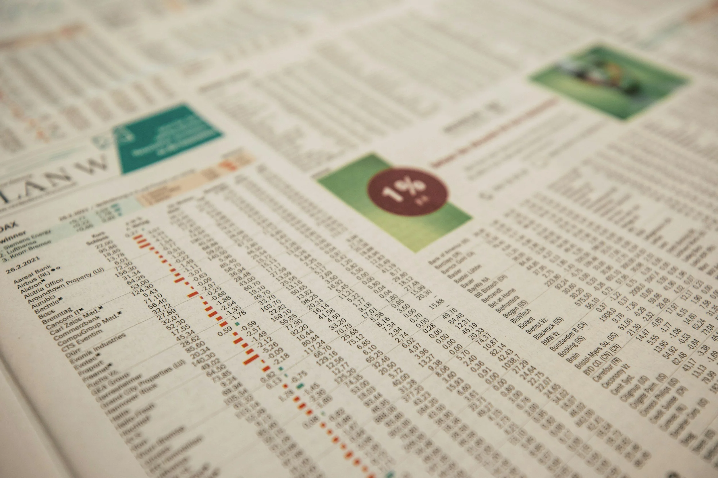 A newspaper with stock market data and financial information.