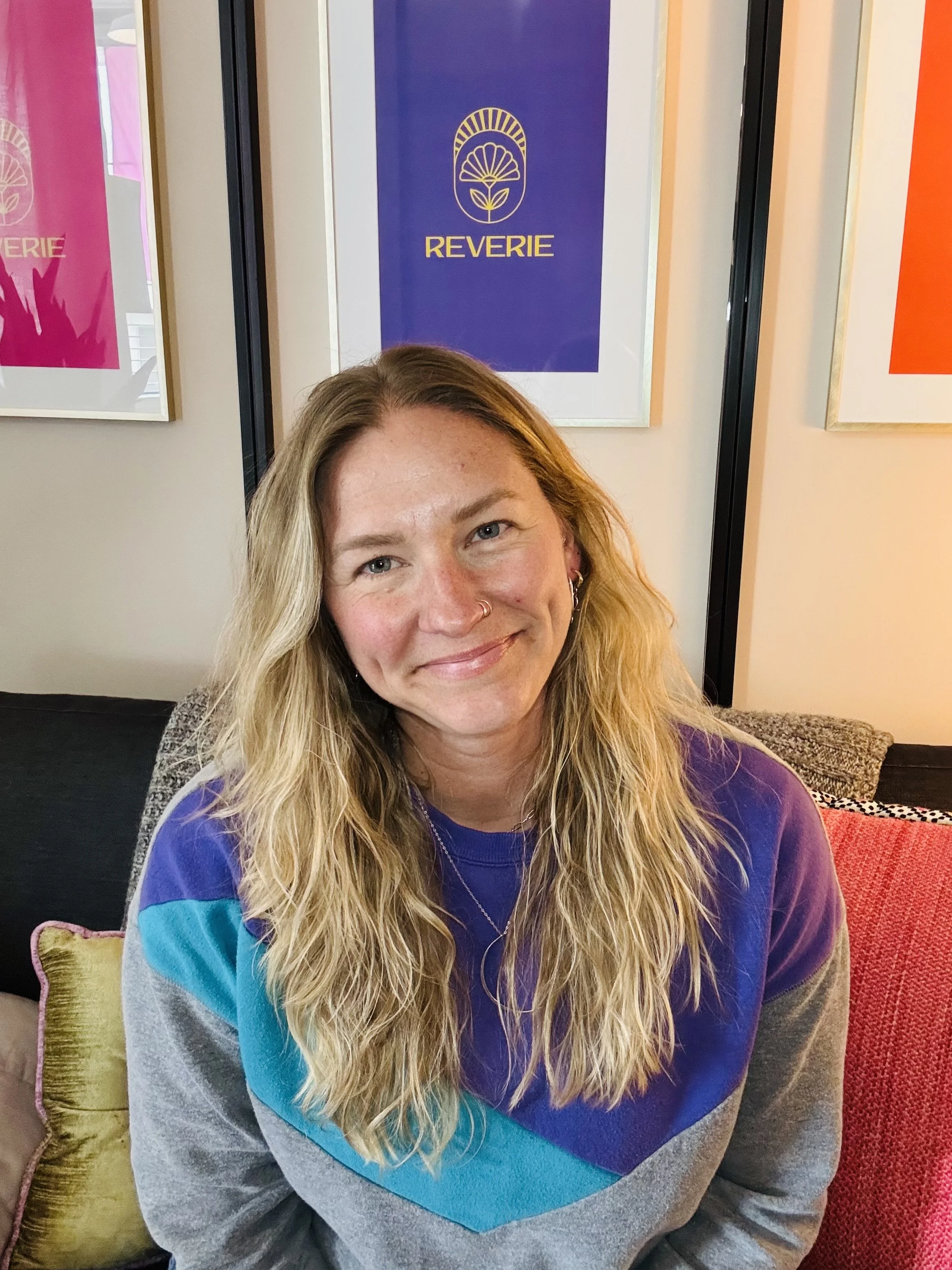therapist smiling in their office