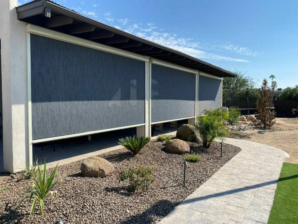MagnaTrack® Screens blocking light on a patio.