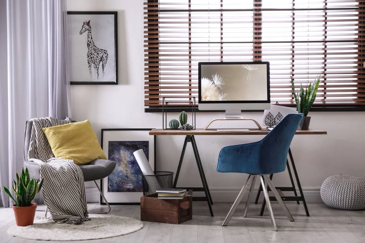 Wood office blinds covering a window in a modern home office