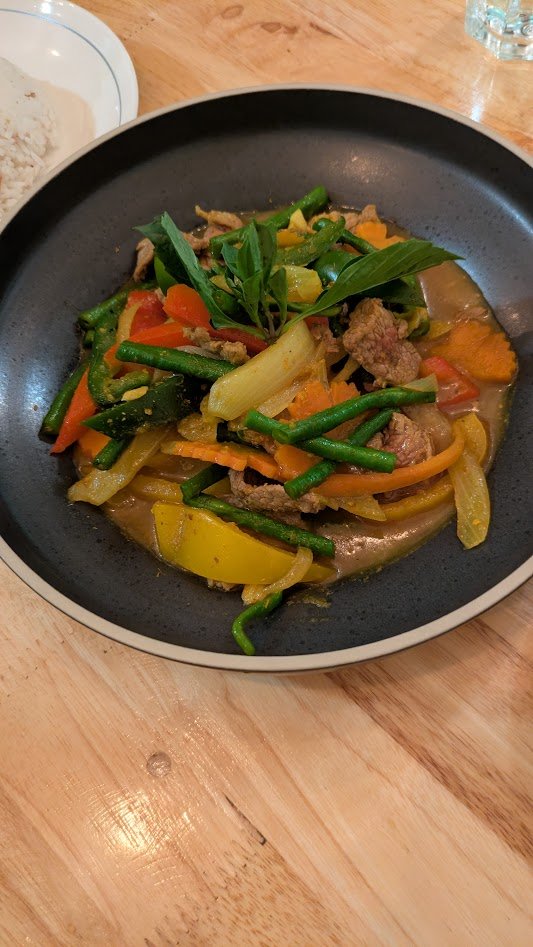 Char Kroeung - a popular Cambodian stir-fry dish characterized by its bold spicy flavor. It has chicken stir-fried with kroeung, a traditional Khmer lemongrass-based herb paste, turmeric, herbs, green beans peppers, and Thai basil. Grady said it was 