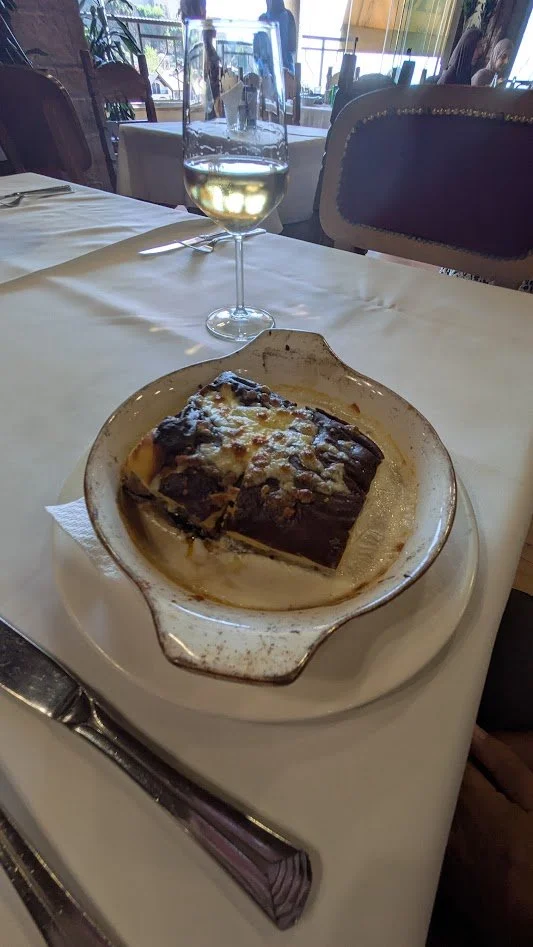 Moussaka - We also had this in Greece, but the ingredients vary slightly. Grady said it was really good, but different from what he had in Greece which he liked a lot as well. It has layers of sliced, pan-fried potatoes, meat (beef or pork), and onio
