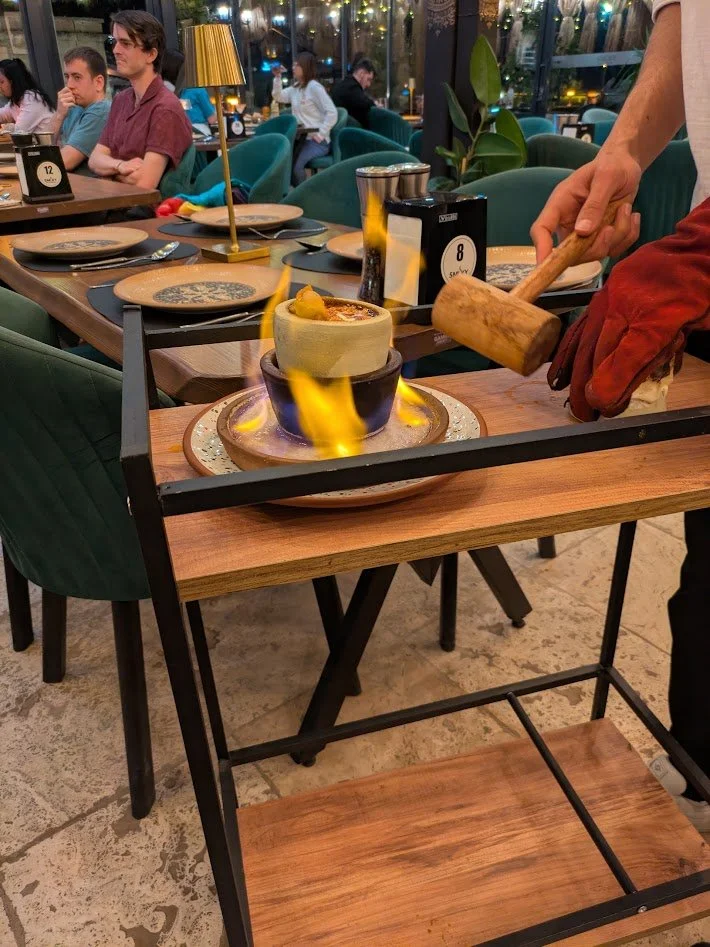  Kuzu Testi - a traditional kebab made by filling a clay pot with a mixture of lamb, vegetables  and spices then sealed with dough to keep the steam inside. The sealed pot is placed over hot coals to cook for a few hours, then brought to the table an