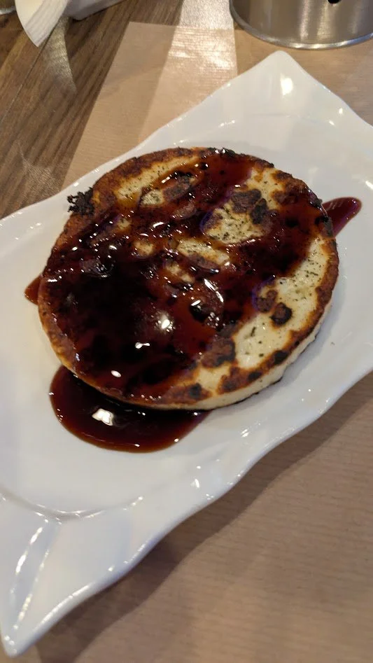 Grilled Talagani - A traditional handmade cheese from sheep and goat's milk grilled and drizzled with balsamic. Really yummy!